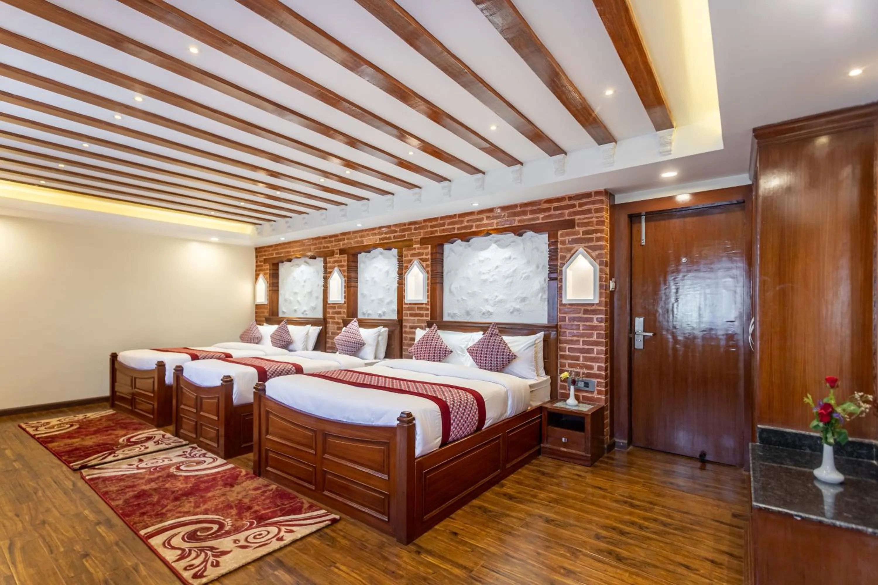 Bed in Amarawati Boutique Hotel
