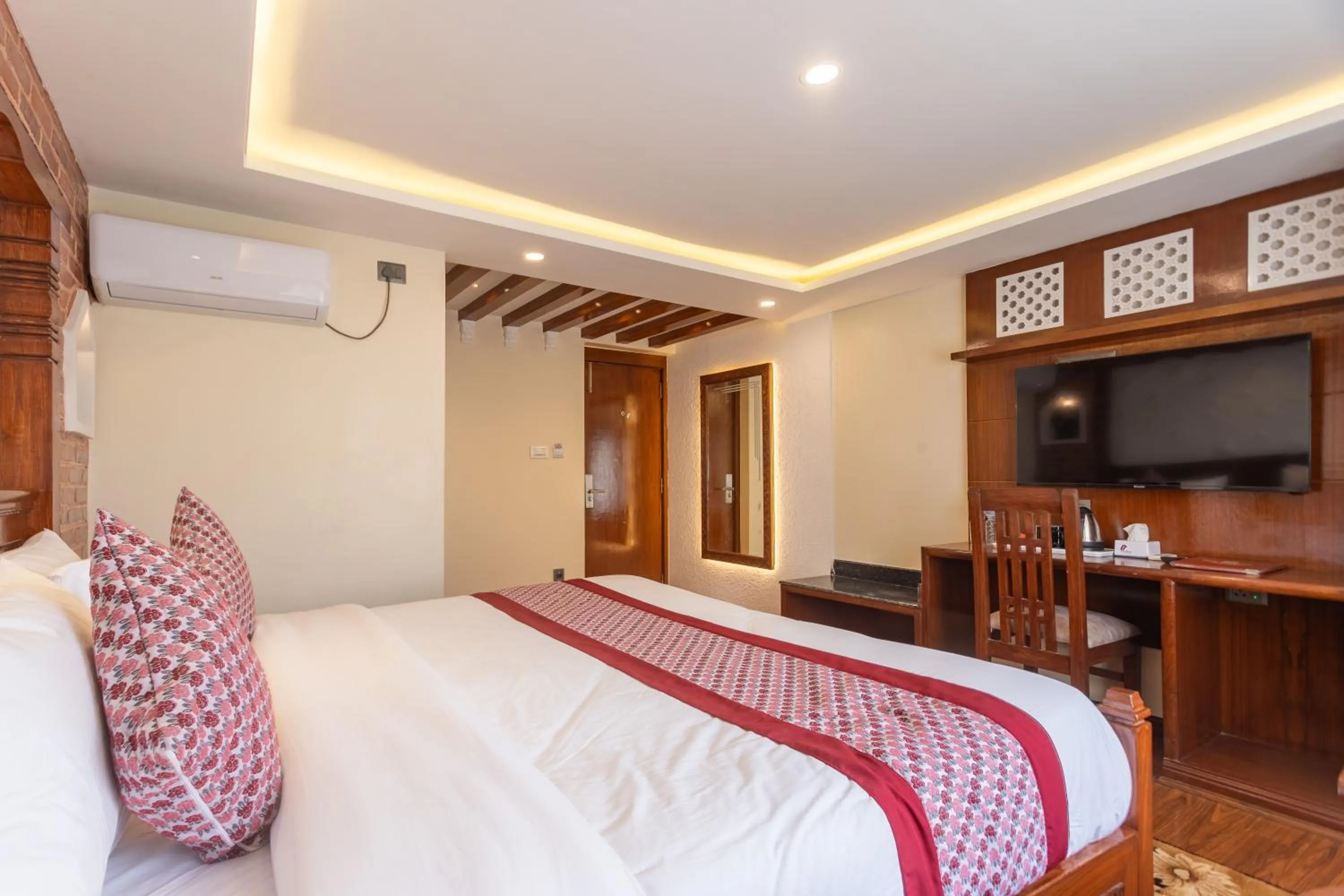 Bed in Amarawati Boutique Hotel