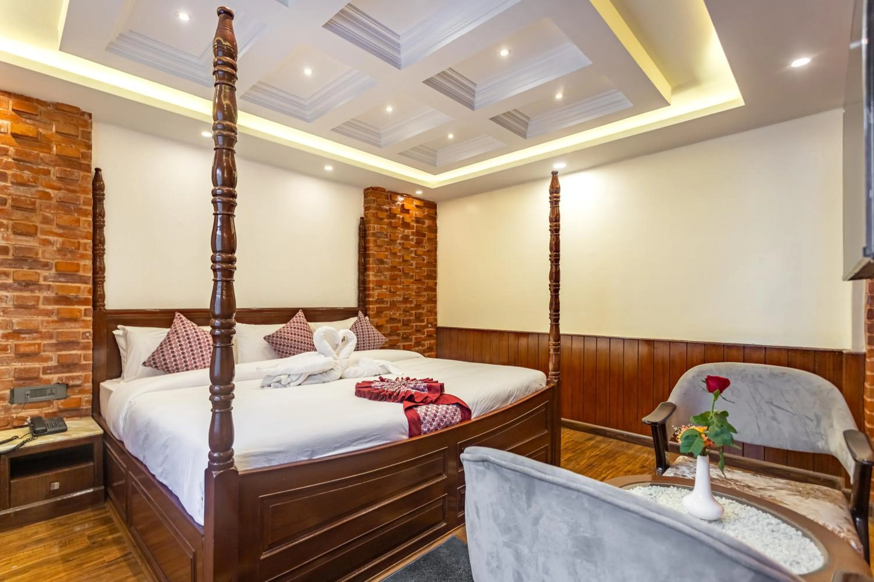 Bed in Amarawati Boutique Hotel
