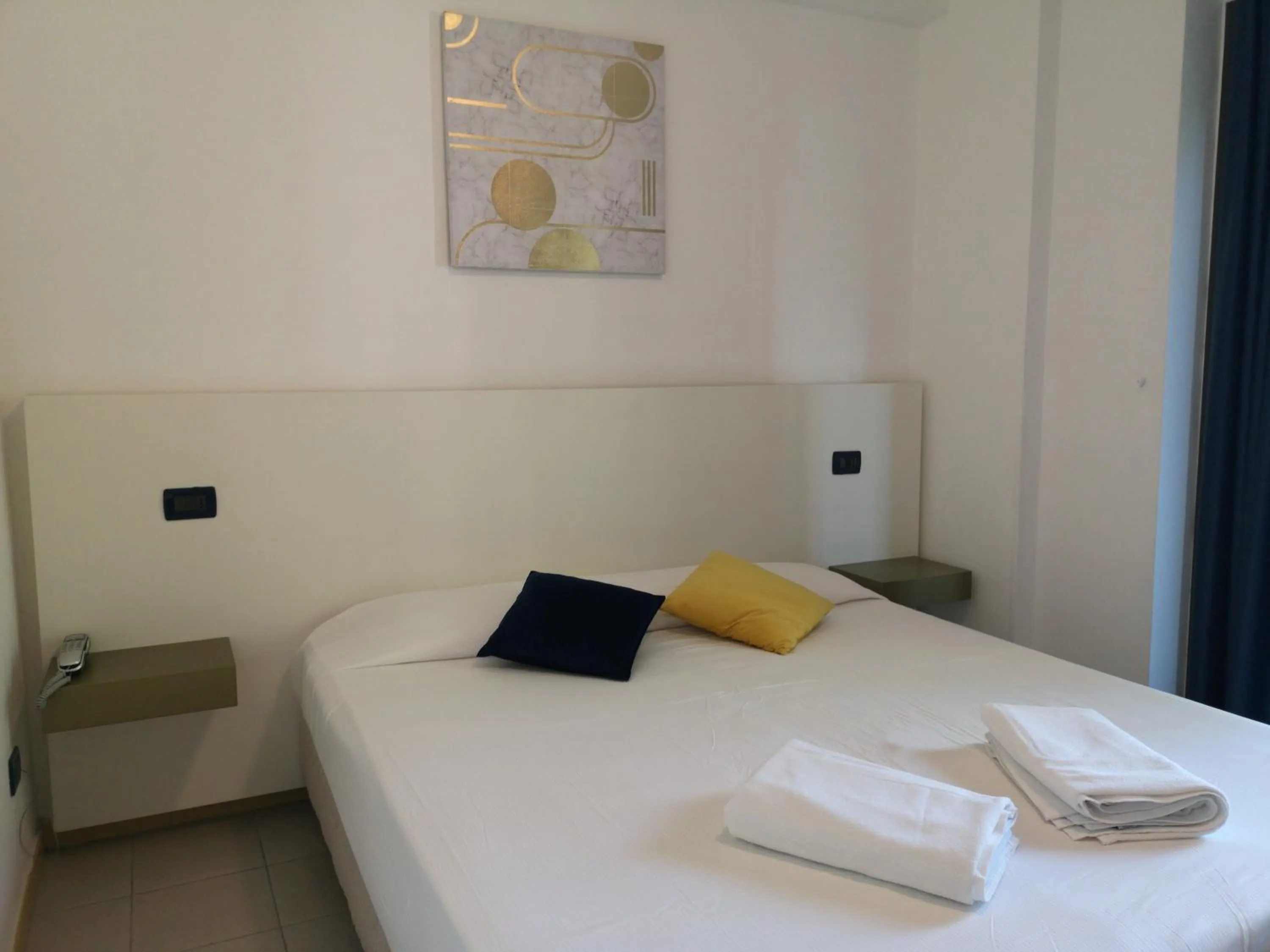 Bed in Oasi Park Hotel