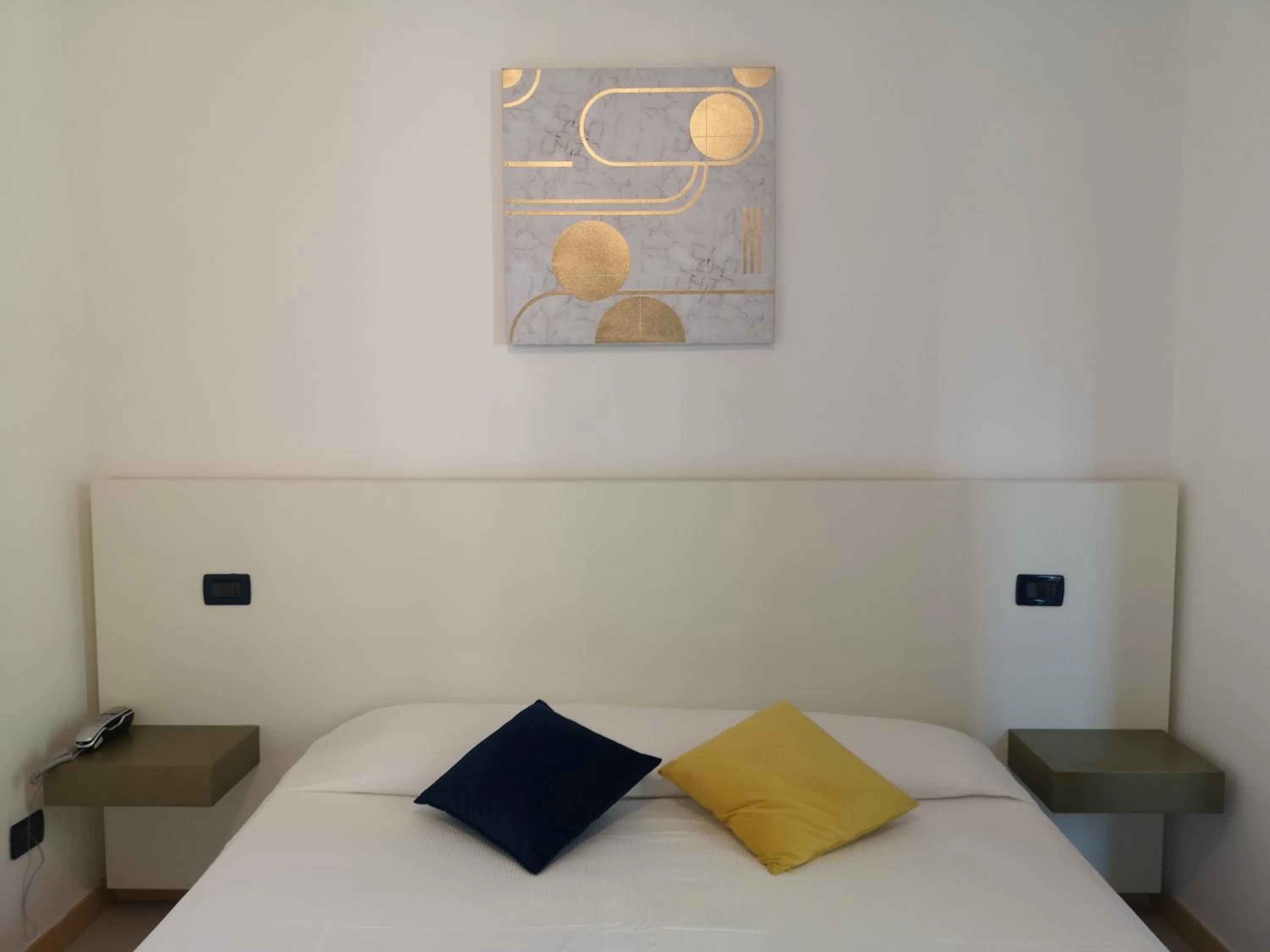 Bed in Oasi Park Hotel