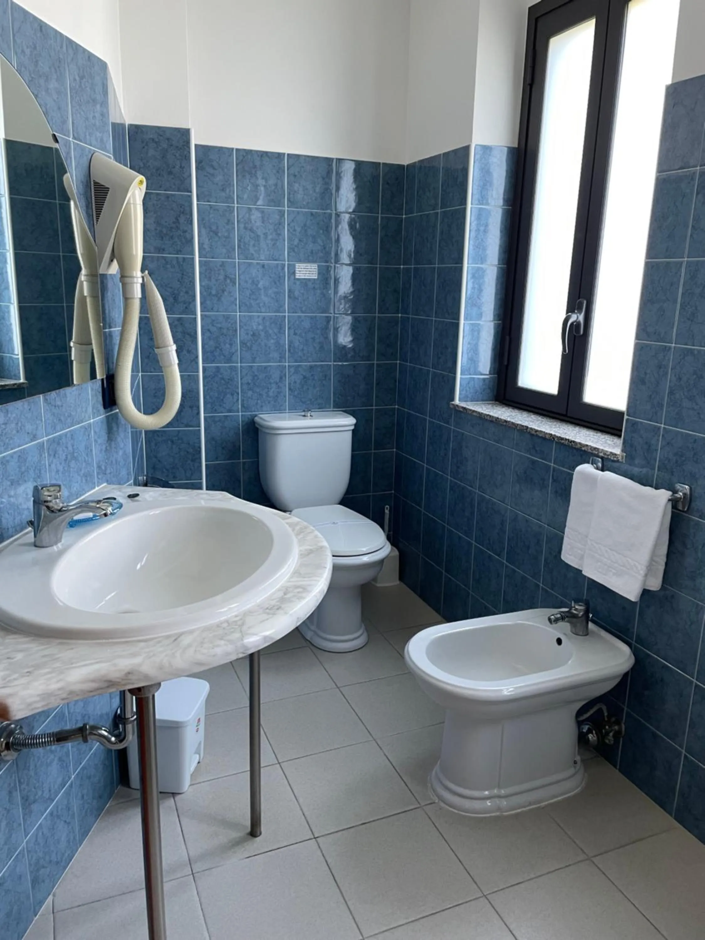 Bathroom in Oasi Park Hotel