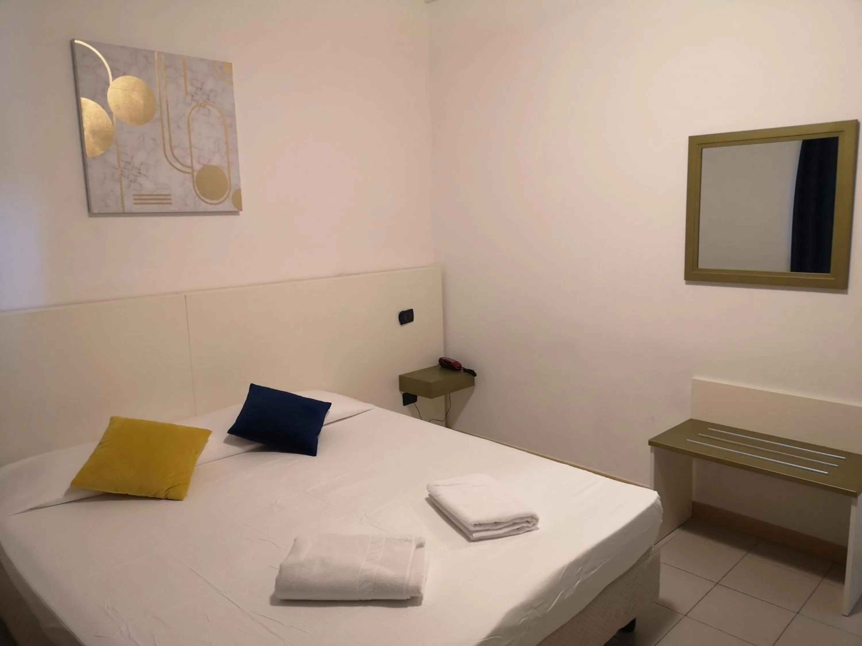 Bed in Oasi Park Hotel