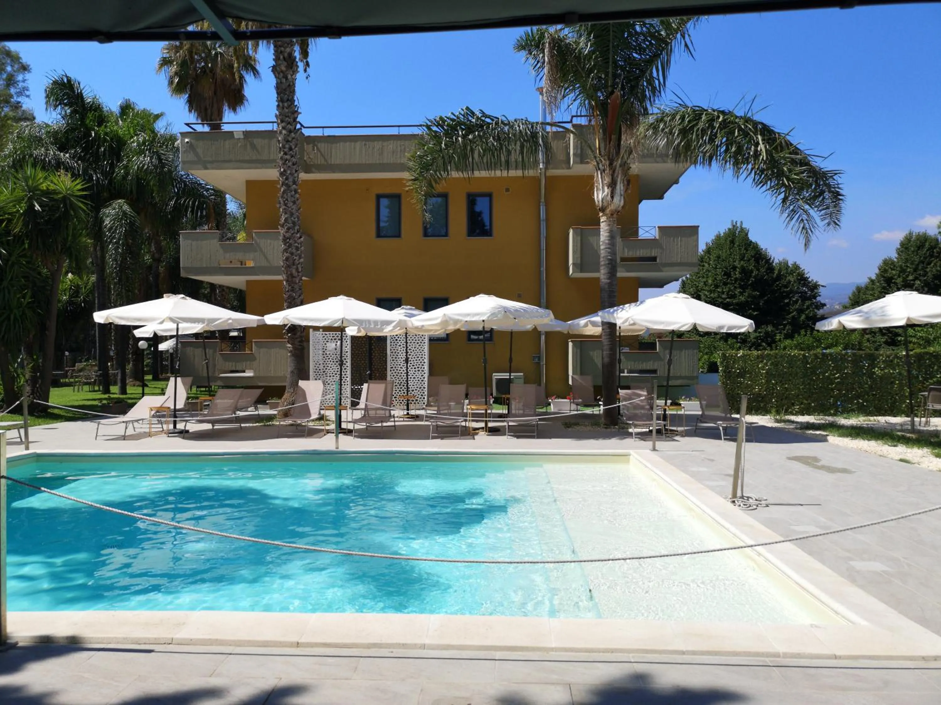 Swimming pool in Oasi Park Hotel