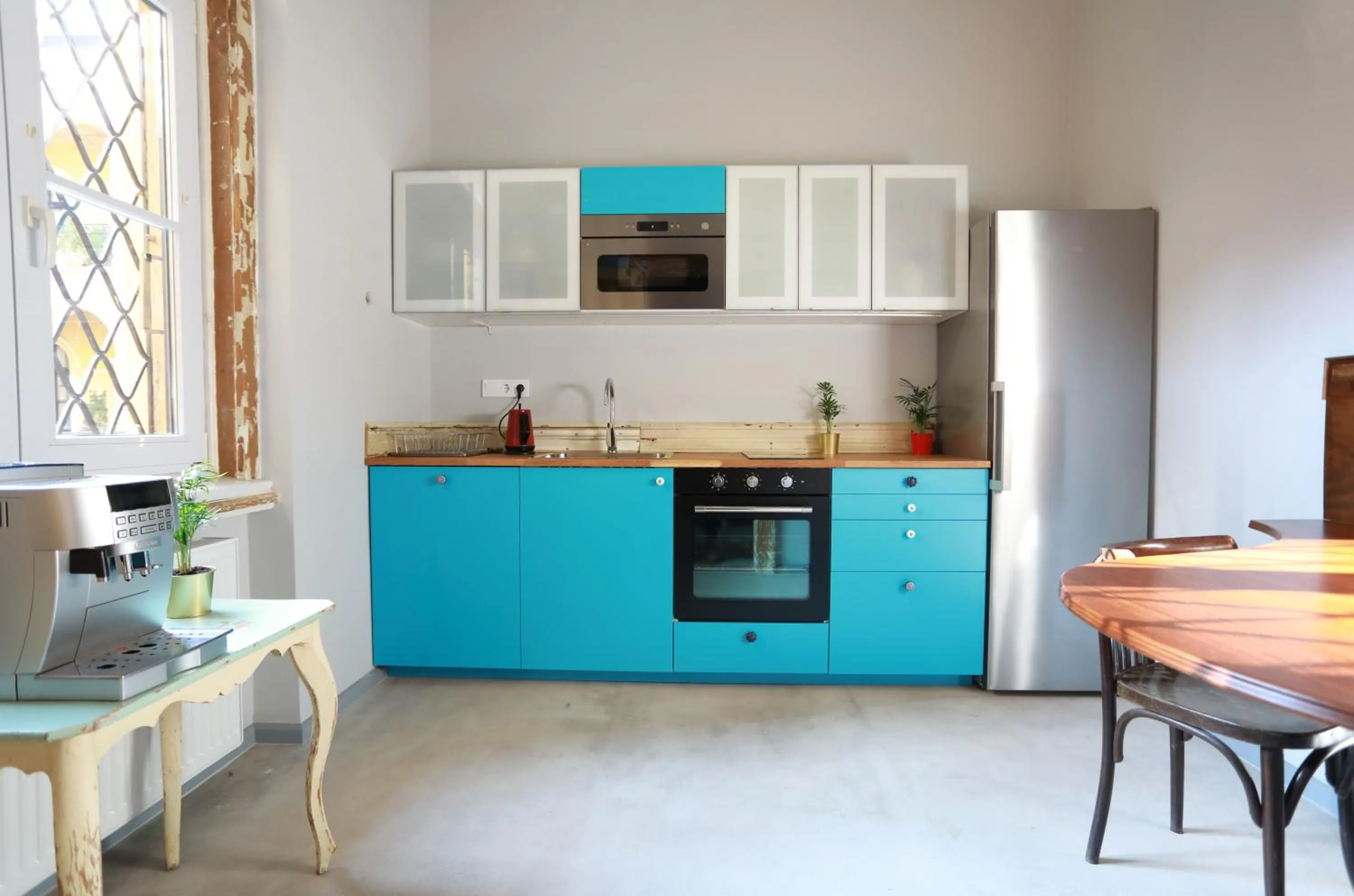 Kitchen or kitchenette in BudapeStayz - Raday Rooms