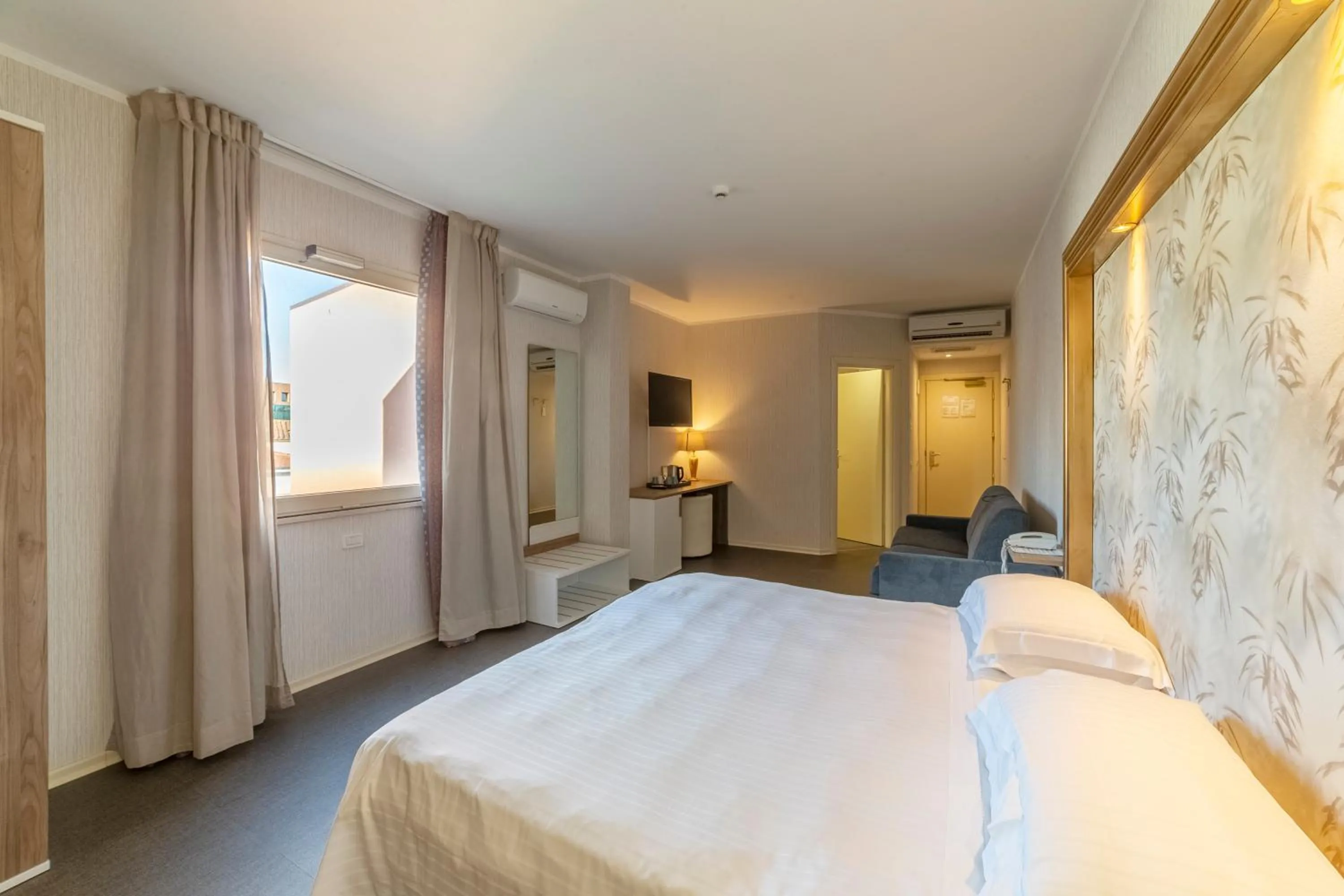 Bed in Hotel Repubblica Marinara