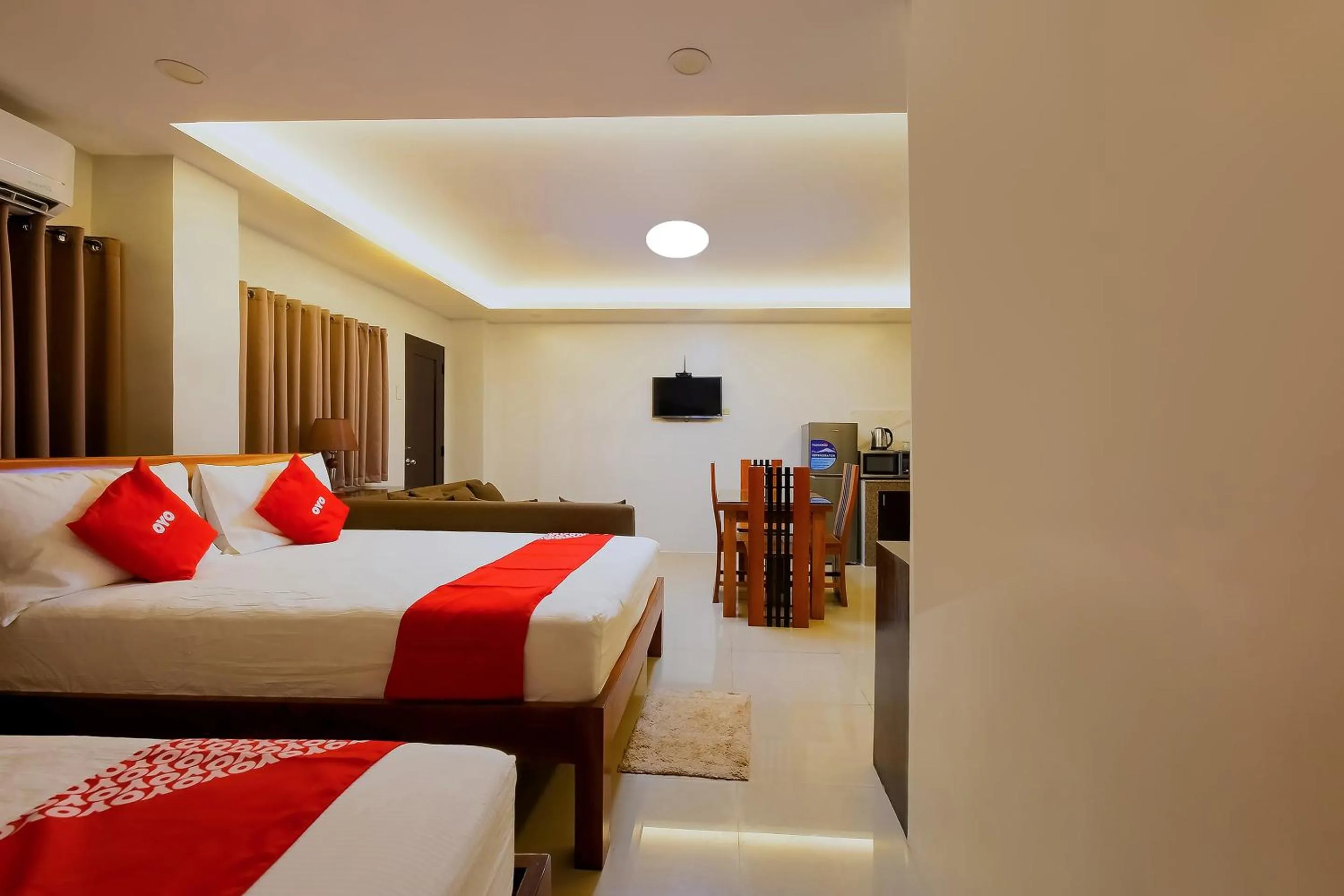 Bedroom in OYO 848 Dona Aurora Condotel