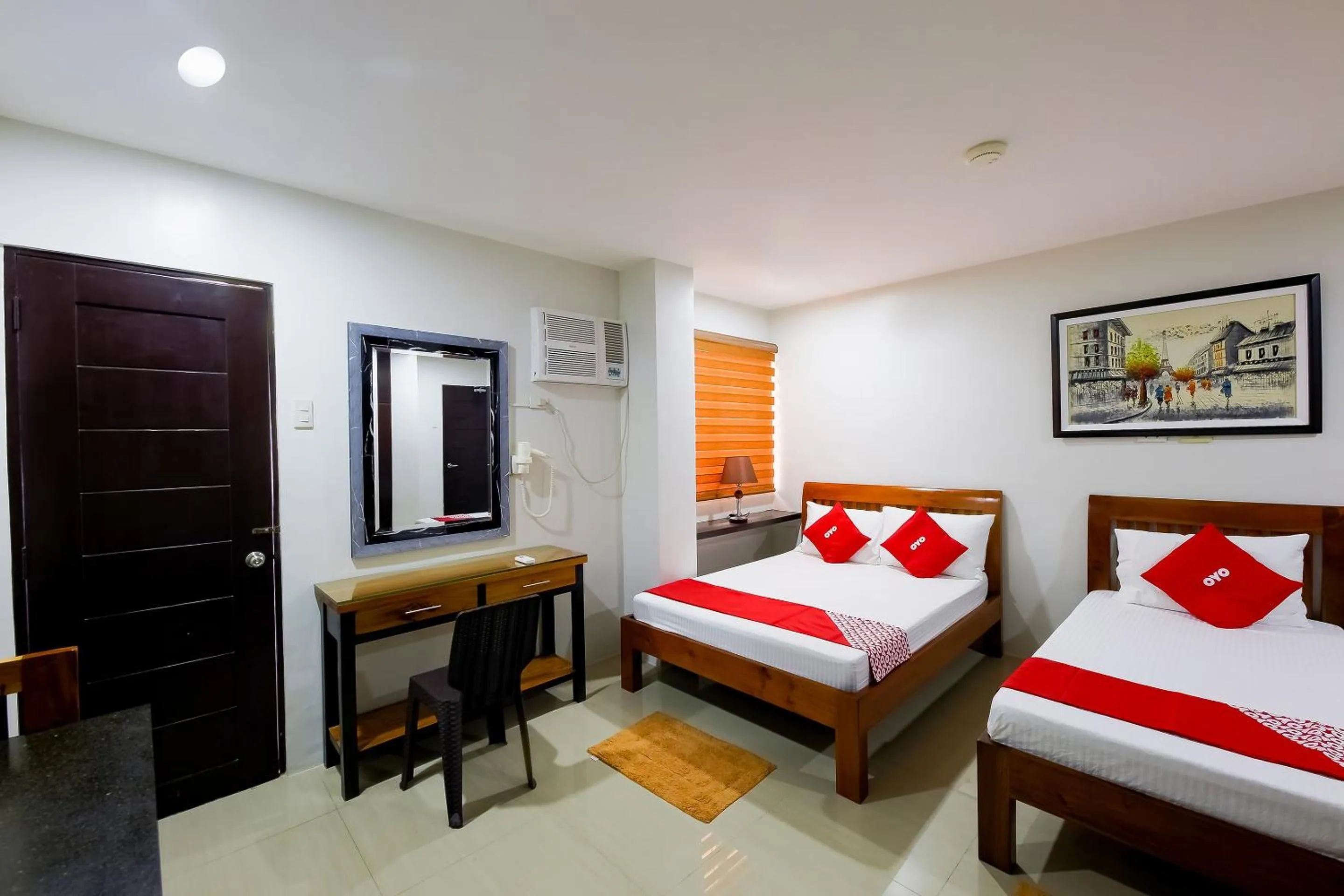 Bedroom in OYO 848 Dona Aurora Condotel