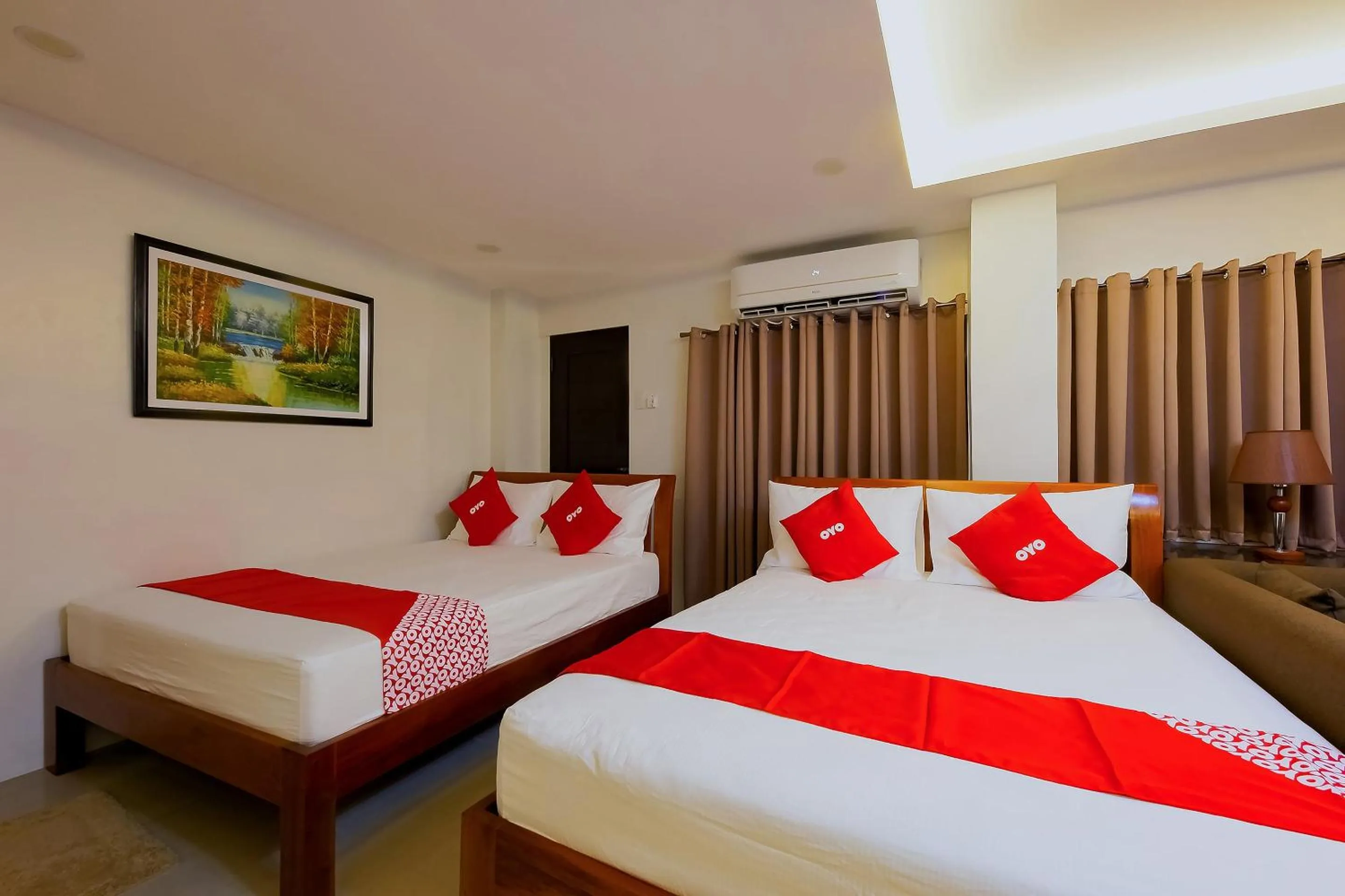 Bedroom in OYO 848 Dona Aurora Condotel