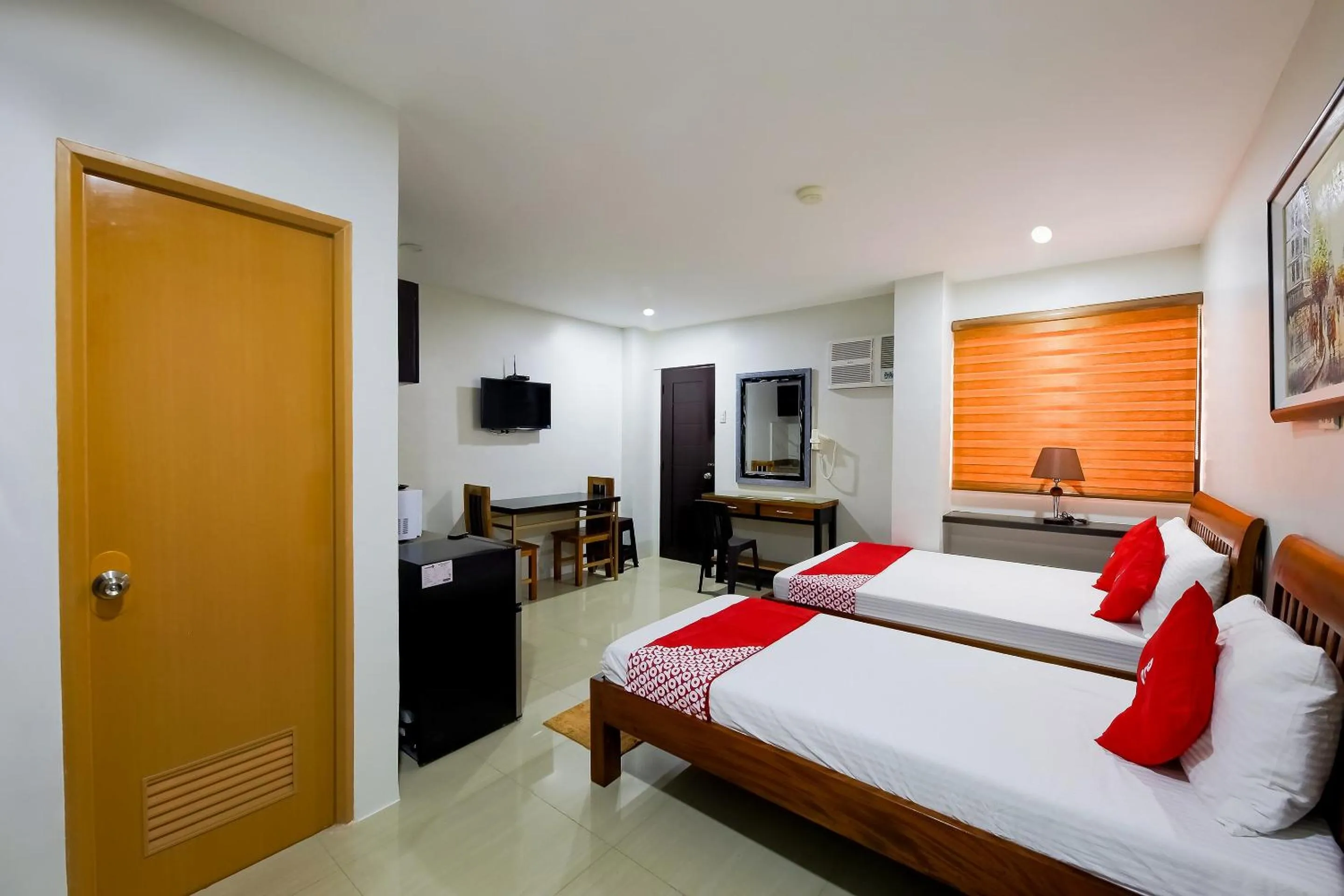 Bedroom in OYO 848 Dona Aurora Condotel