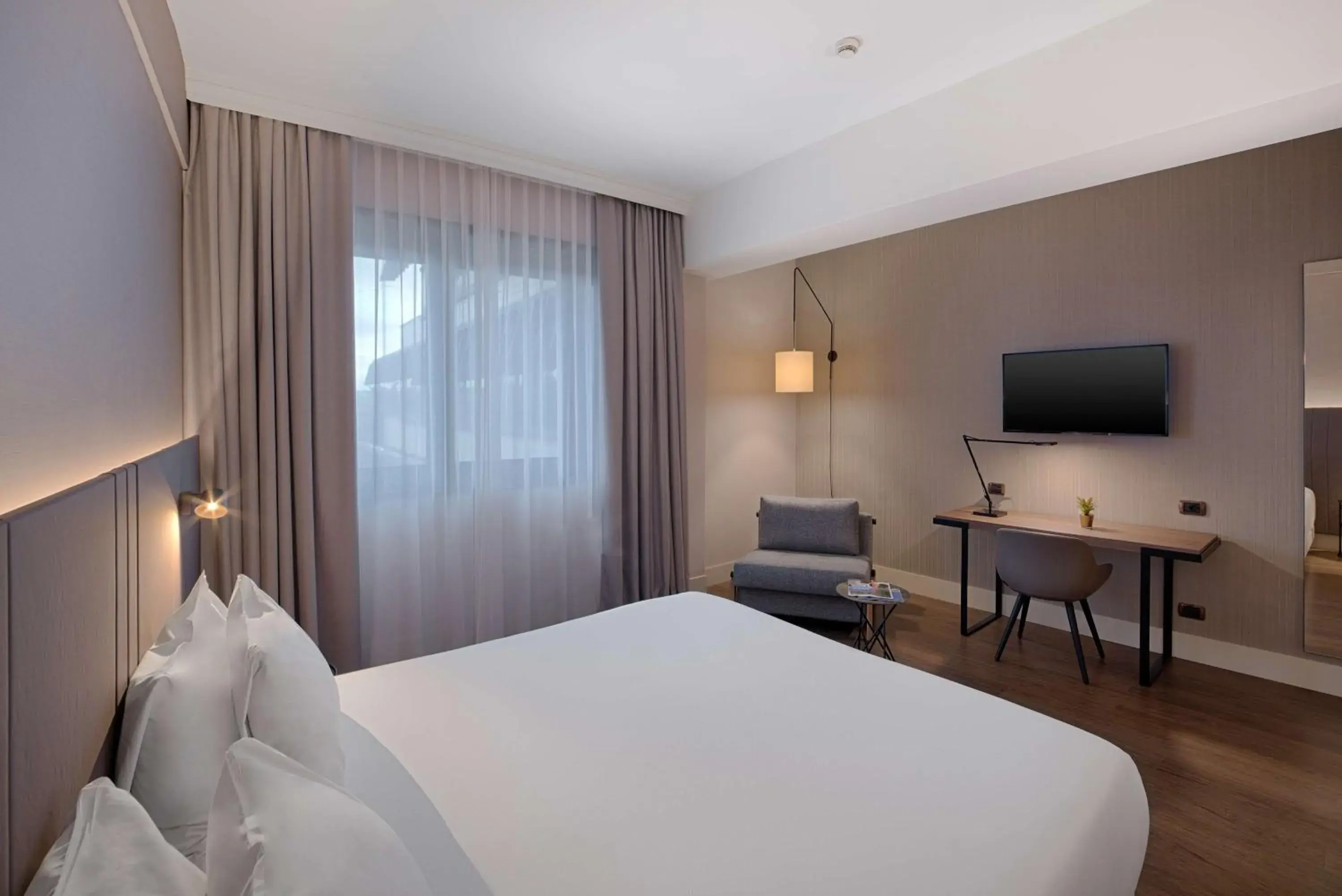 Photo of the whole room, Bed in NH Roma Villa Carpegna Photo of the whole room, Bed in NH Roma Villa Carpegna