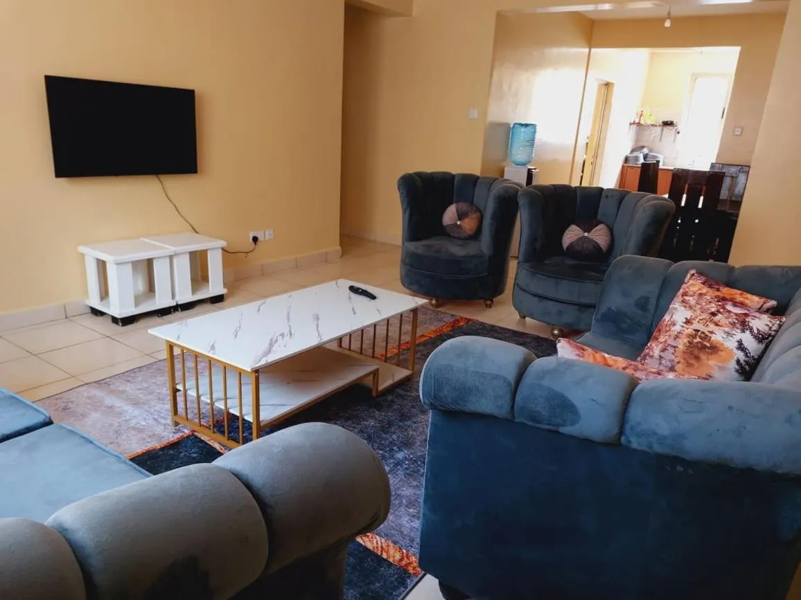 Living room in Lux Suites Honey Dew Stays Athiriver