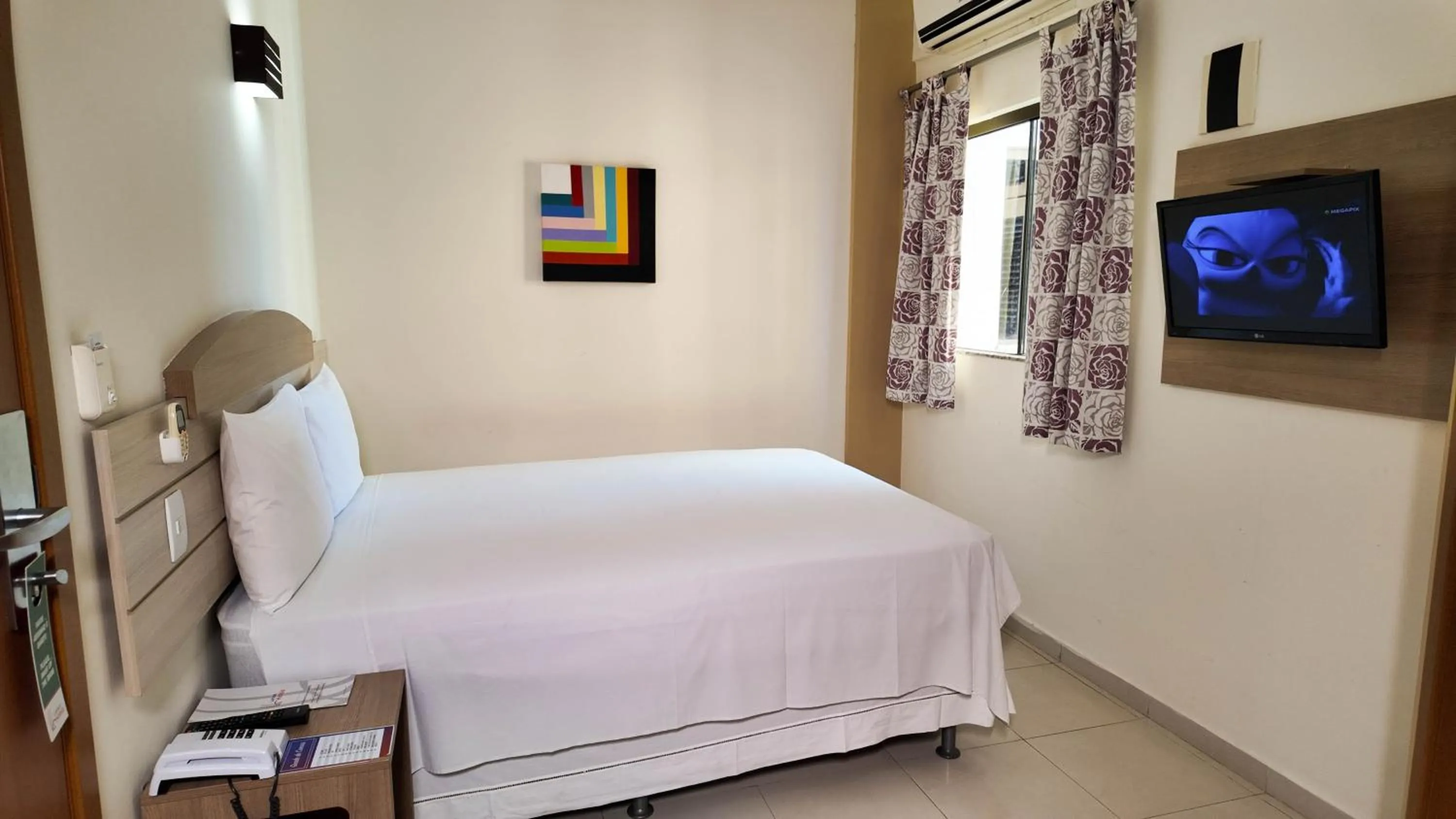 Photo of the whole room, Bed in Larison Executive - by Easy Hotéis