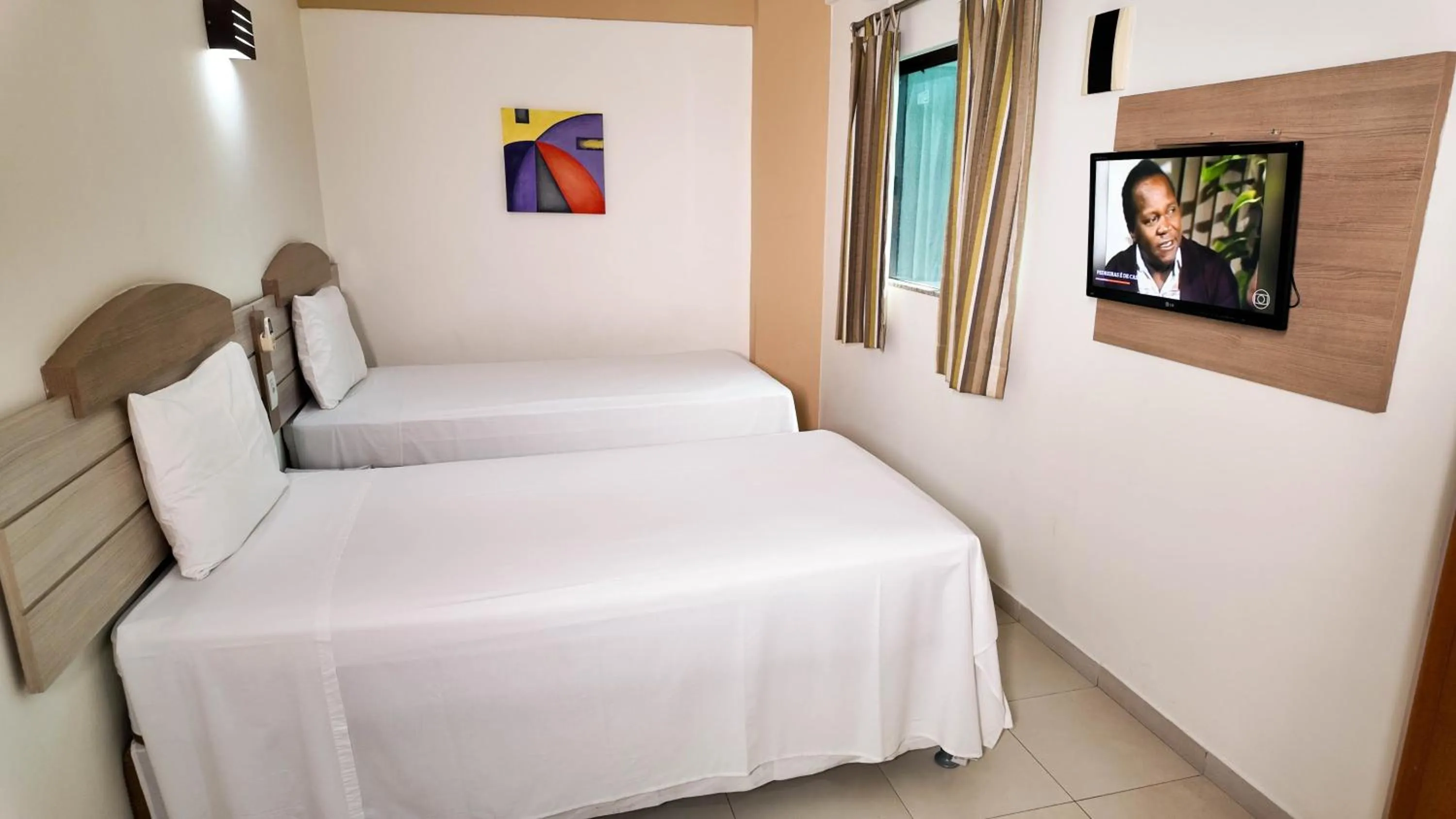 Photo of the whole room, Bed in Larison Executive - by Easy Hotéis