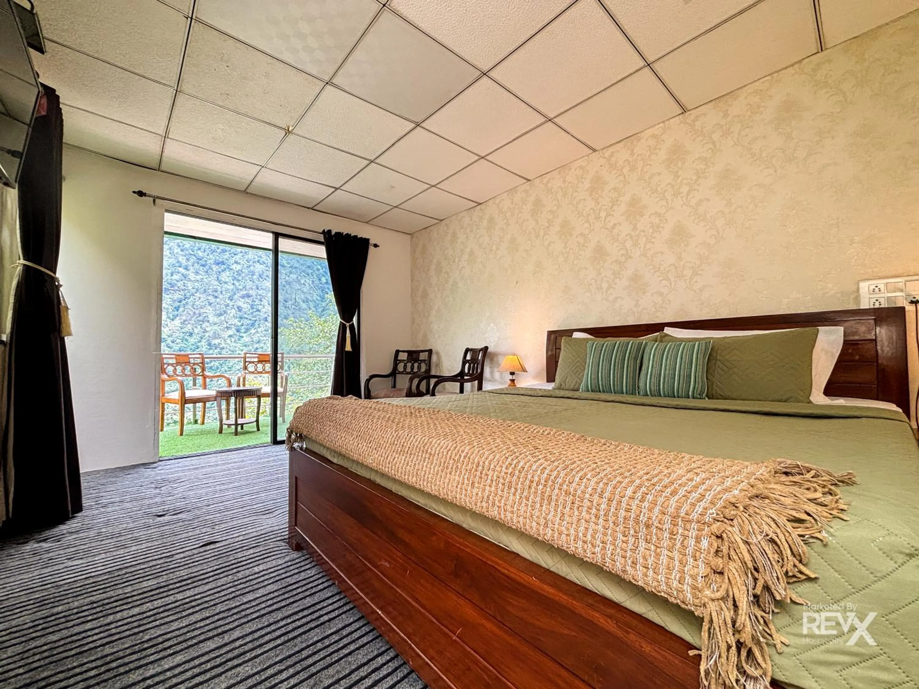 Bed in The Sona Heli Resort