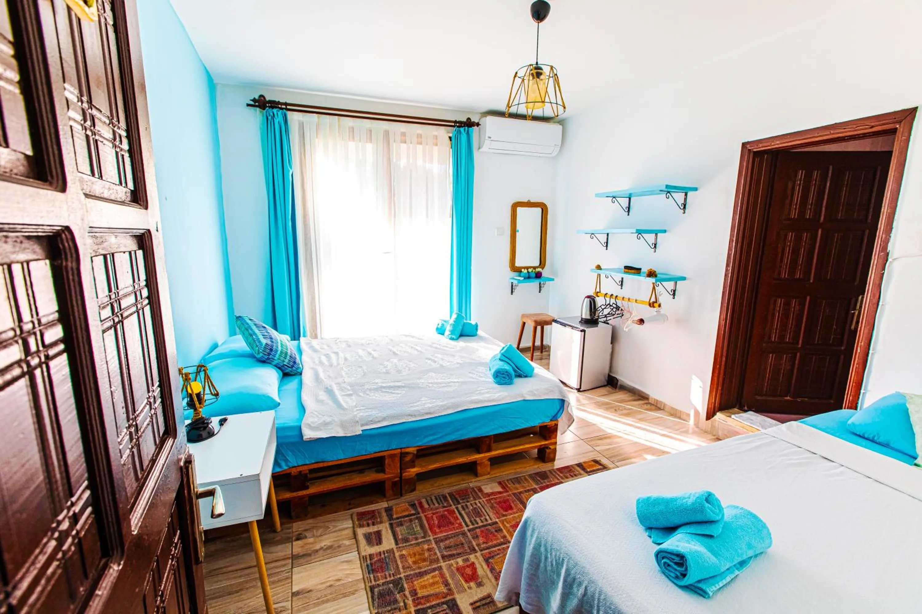 Bed in TUTHALİYA HOTEL