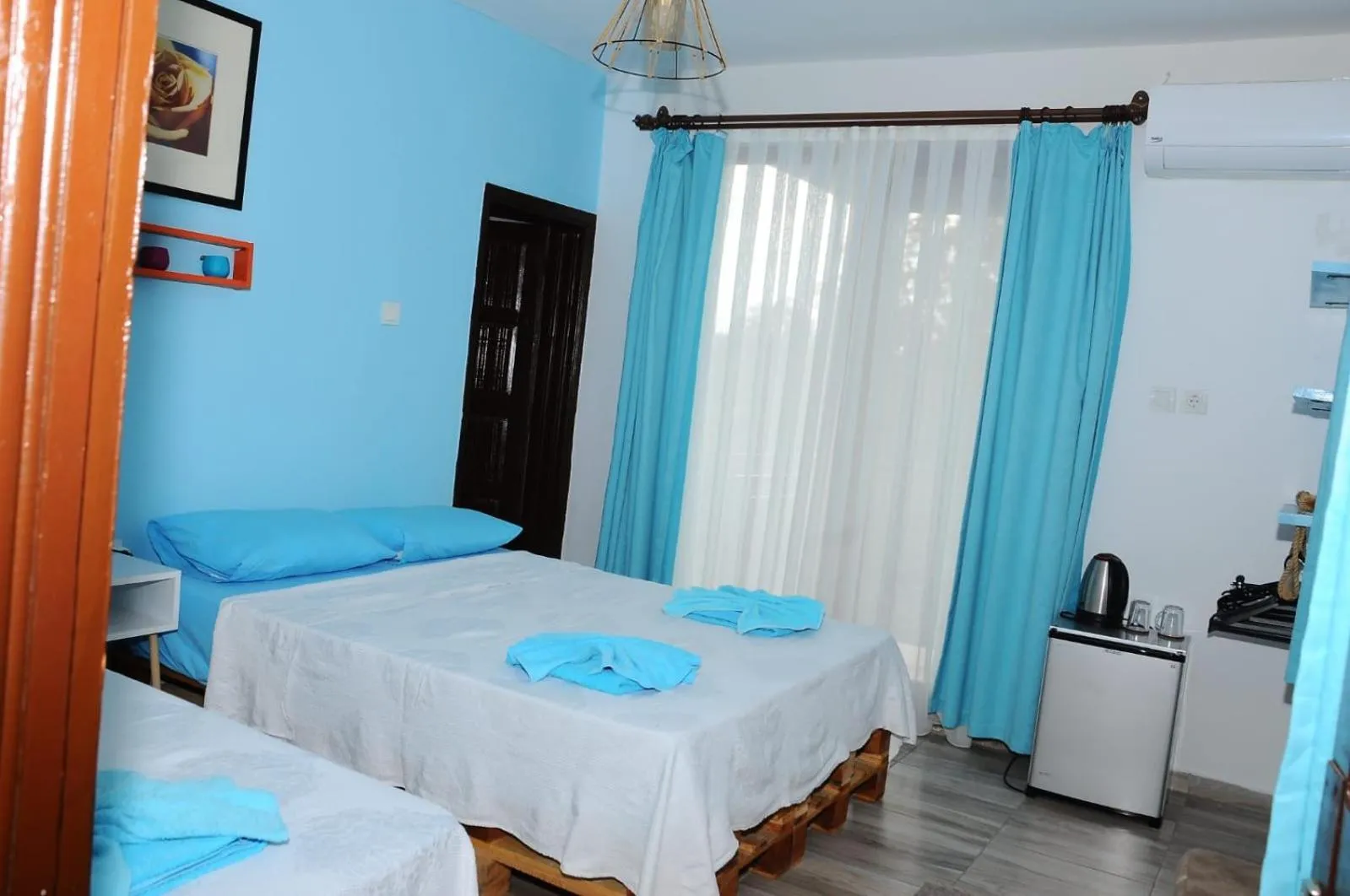 Bed in TUTHALİYA HOTEL