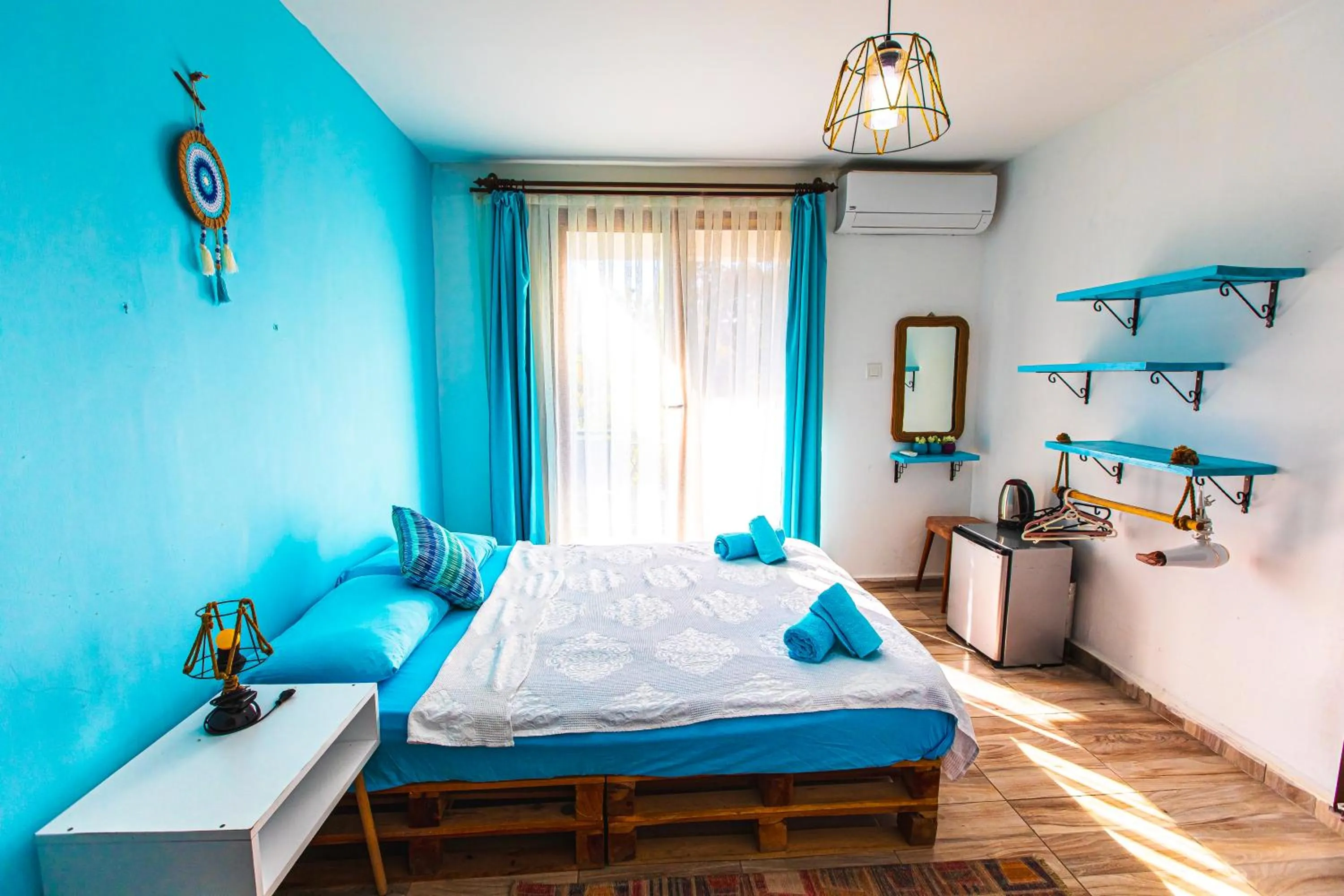 Bed in TUTHALİYA HOTEL