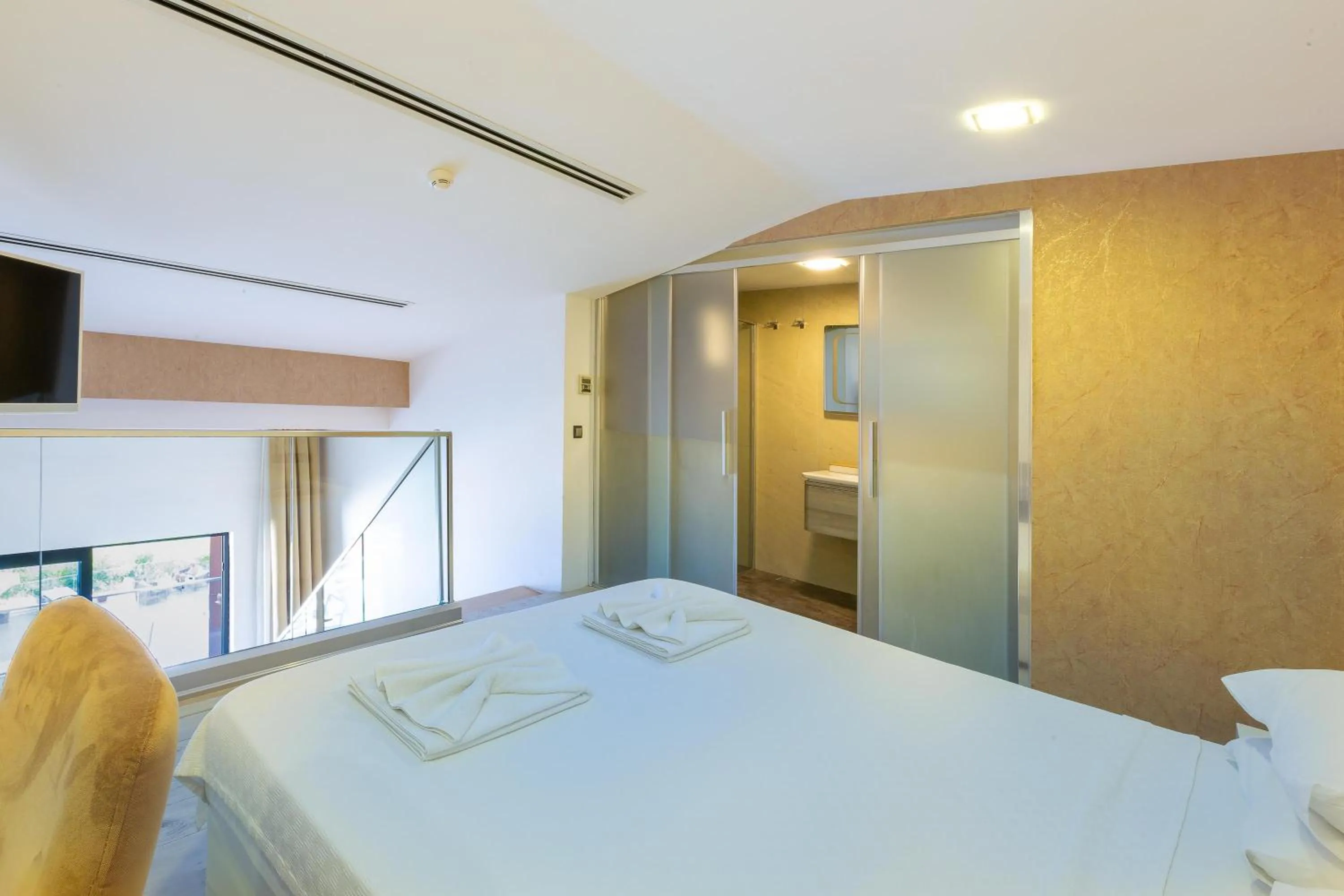 Bed in Rhapsody Hotel & Spa Kalkan