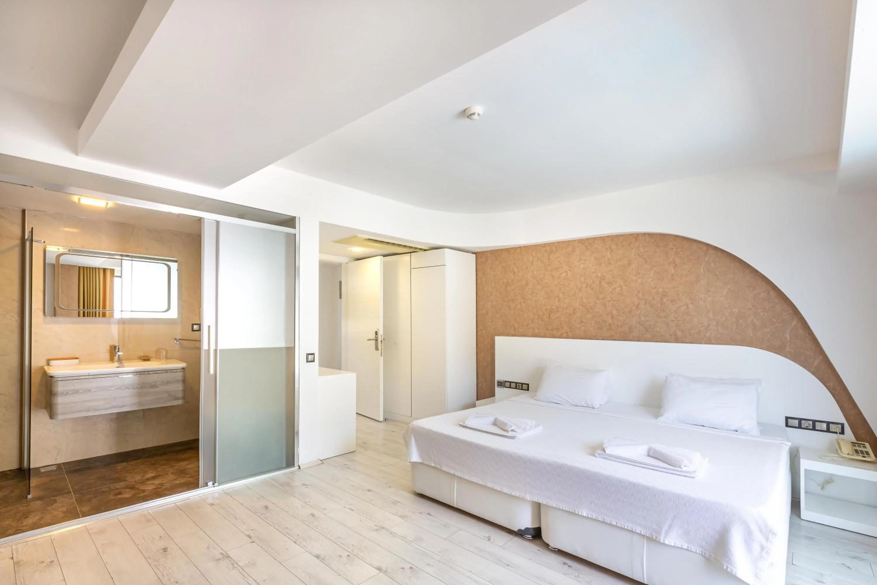 Bed in Rhapsody Hotel & Spa Kalkan