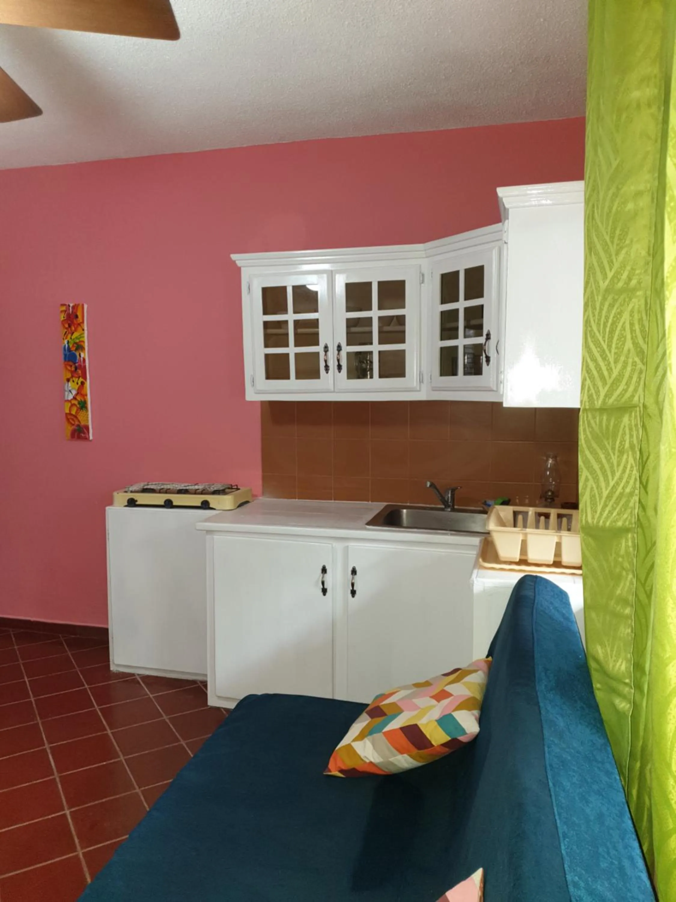 Kitchen or kitchenette in PLAYA BLANCA BED AND BREAKFAST