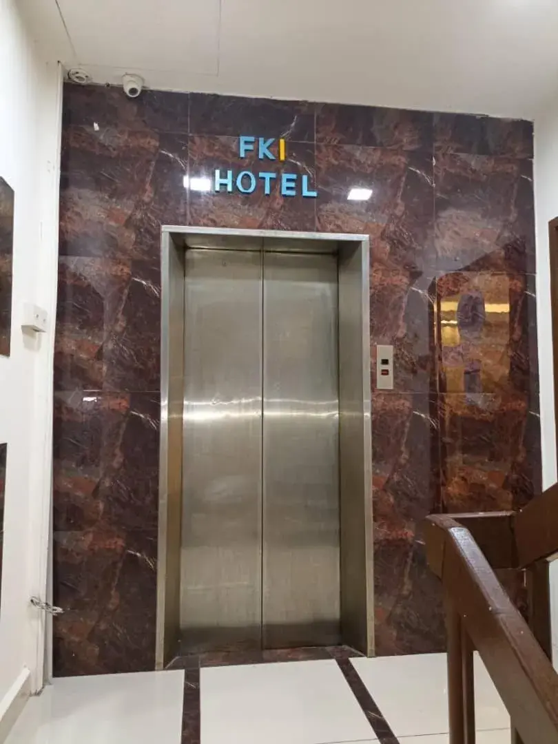 elevator in FKI INTERNATIONAL HOTEL