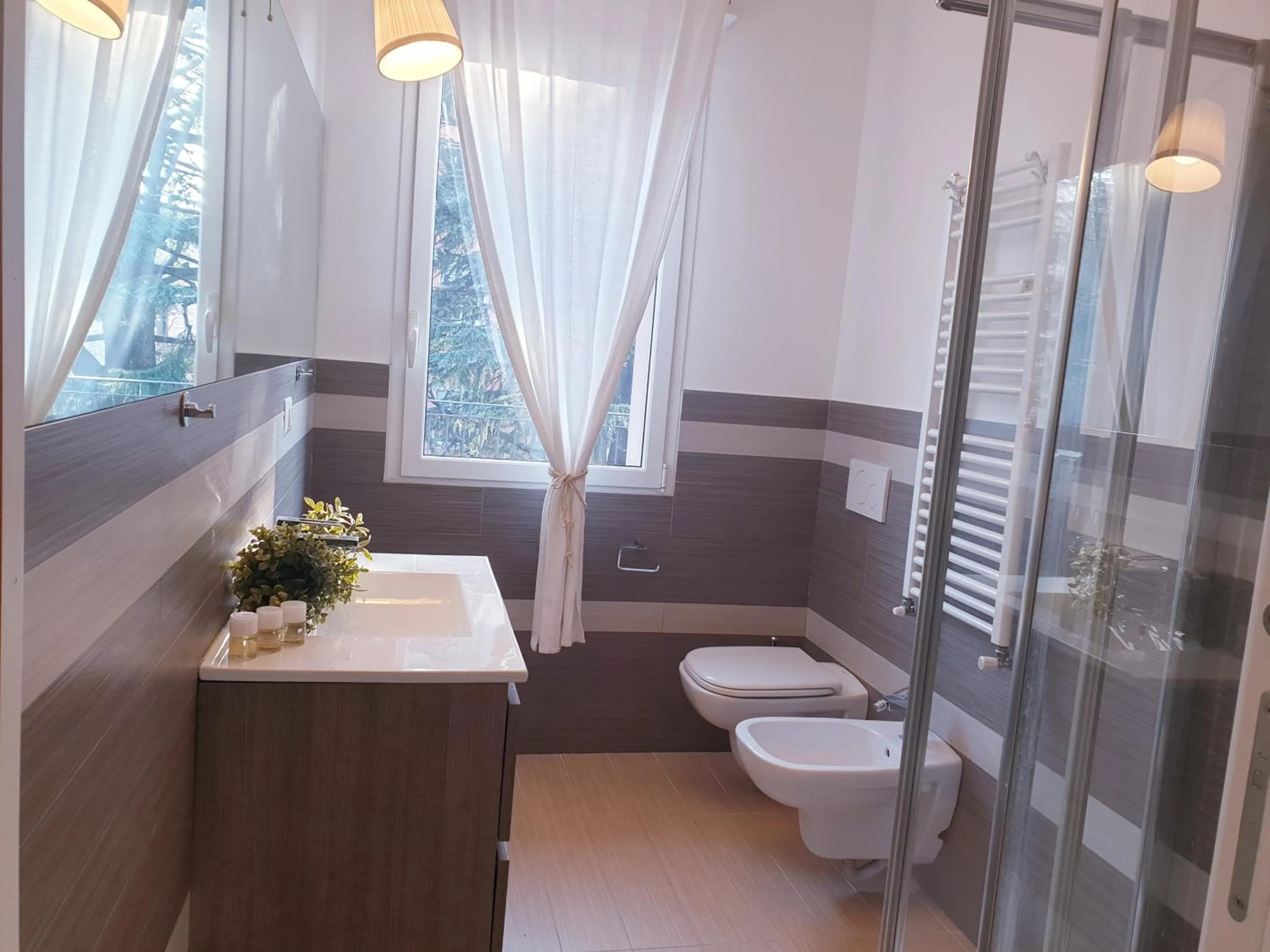 Bathroom in Michelangelo Apartments con parcheggio gratuito in loco e self check in