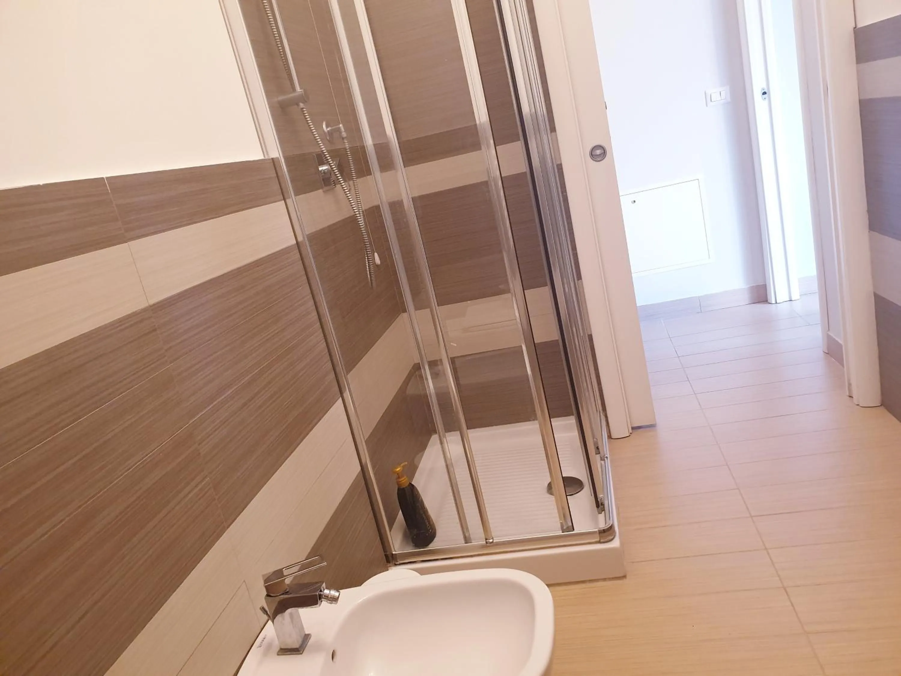 Bathroom in Michelangelo Apartments con parcheggio gratuito in loco e self check in