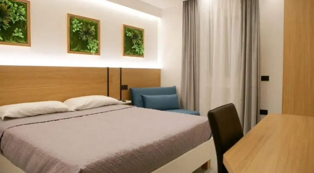 Triple Room in B&B Del Corso Triple Room in B&B Del Corso