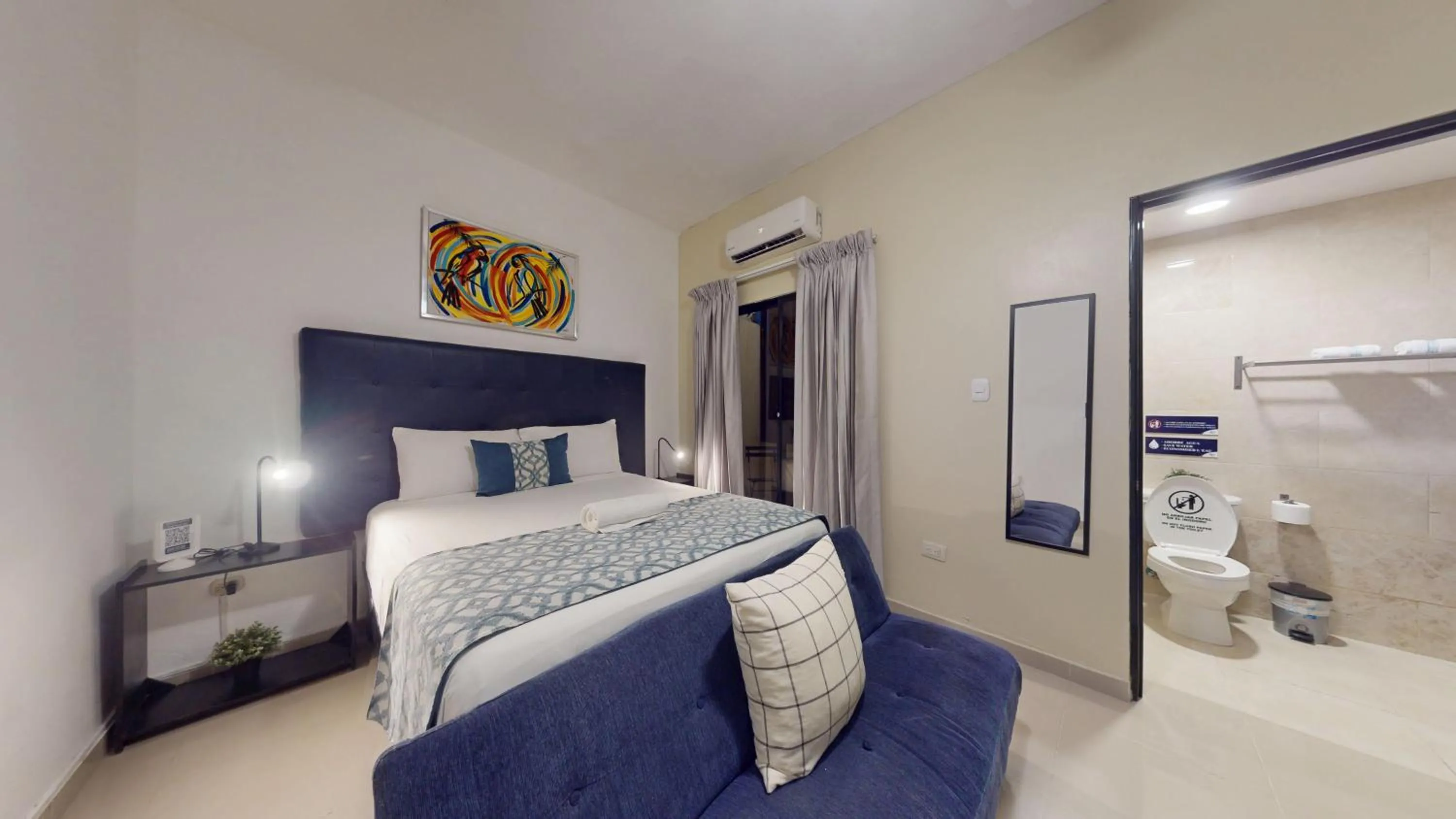 Bed in Hotel Tau Art Residence