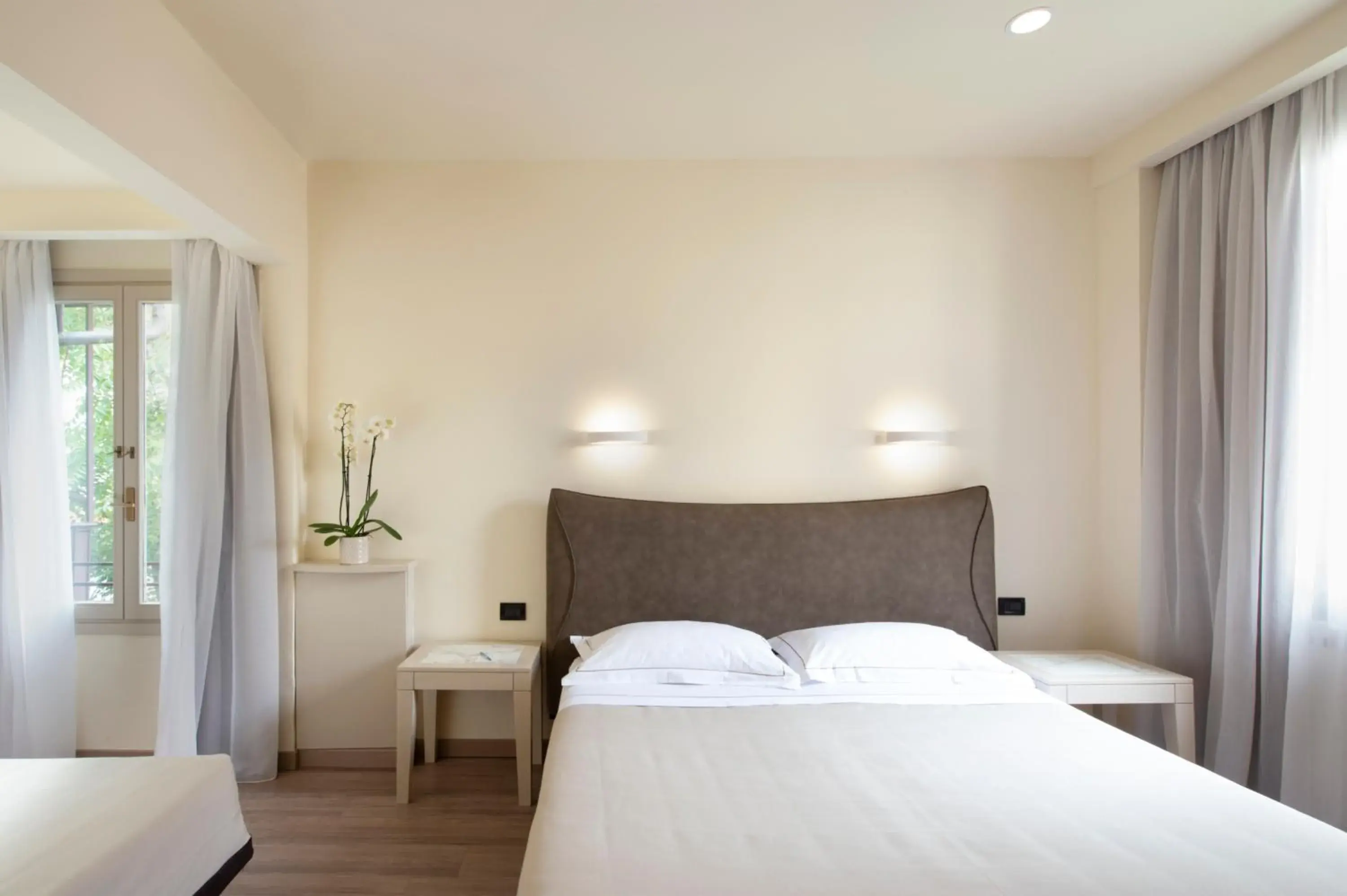 Bedroom, Bed in Hotel Grifone Firenze - Meetings & Spa Bedroom, Bed in Hotel Grifone Firenze - Meetings & Spa