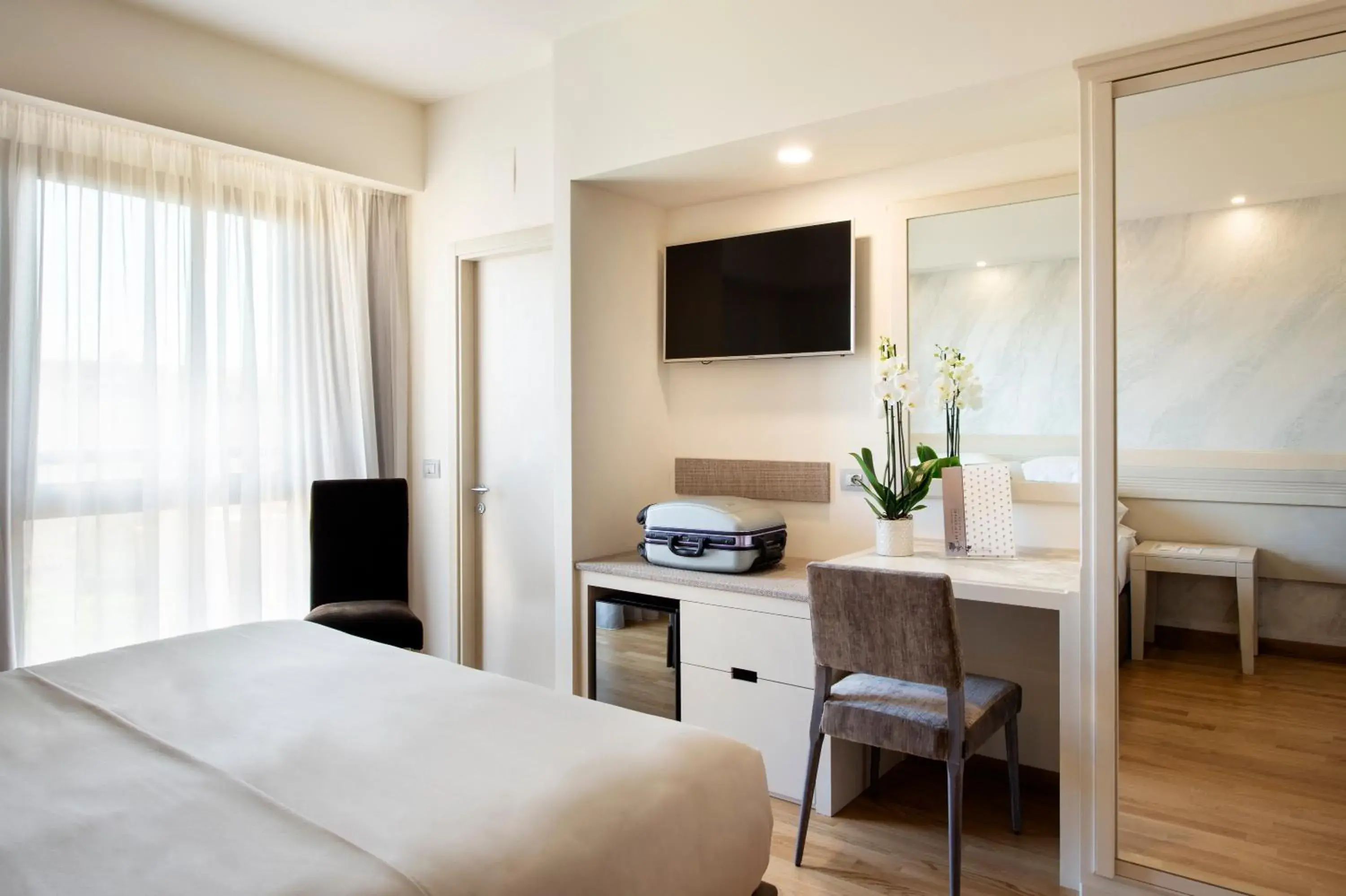 Bedroom, Bed in Hotel Grifone Firenze - Meetings & Spa Bedroom, Bed in Hotel Grifone Firenze - Meetings & Spa