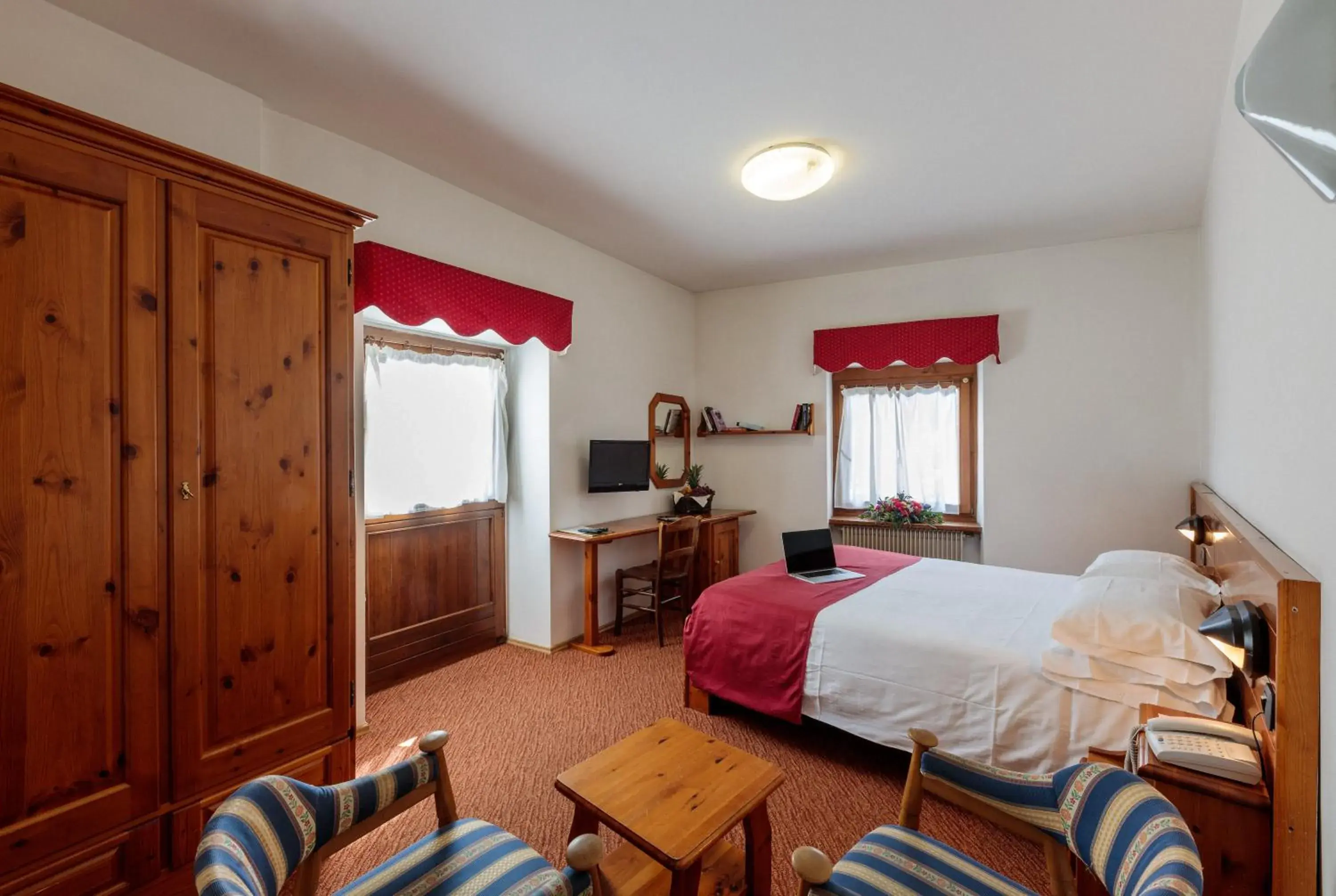 Bed in Hotel Miramonti Corvara Bed in Hotel Miramonti Corvara