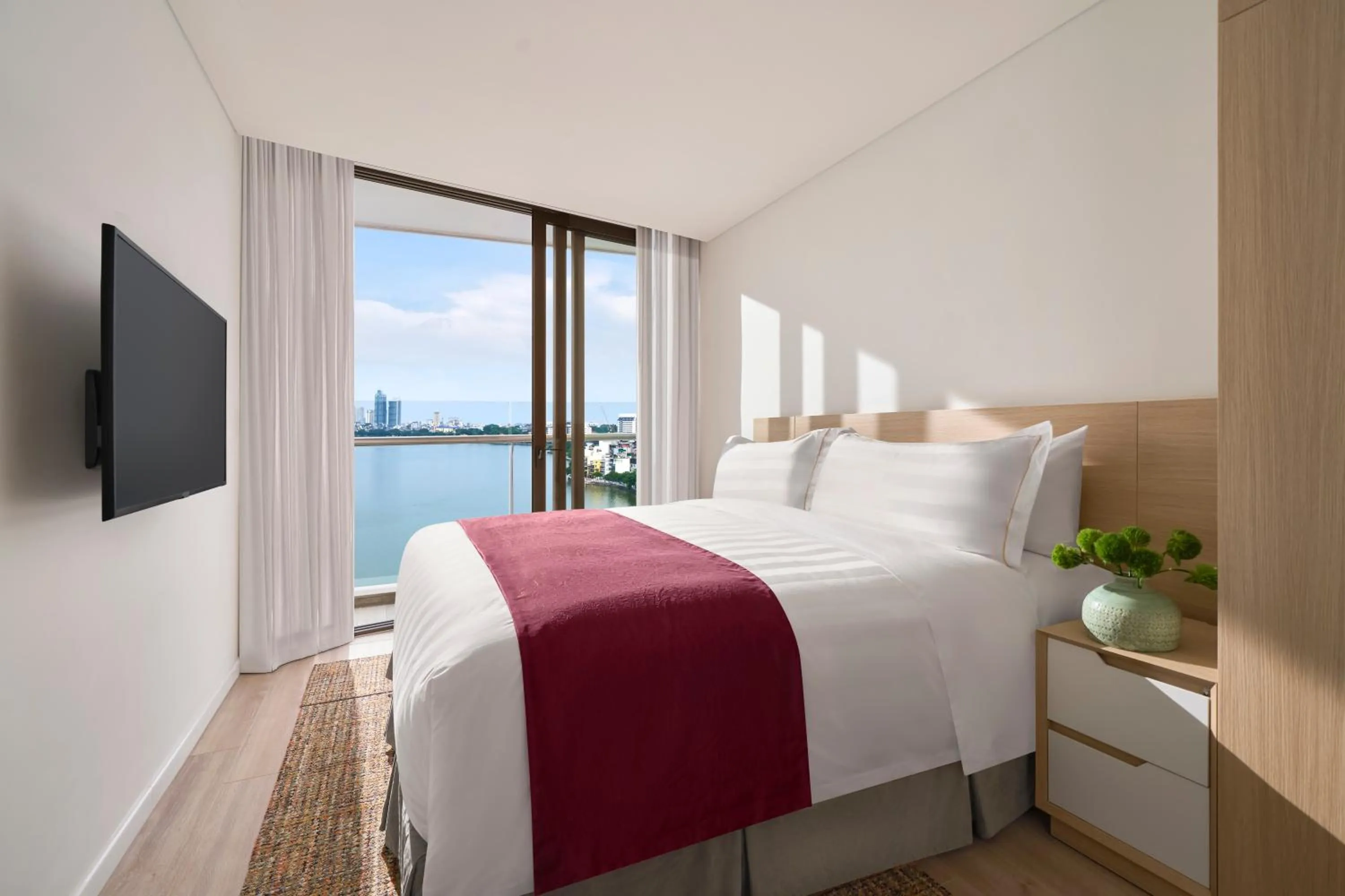 Bedroom, Bed in PARKROYAL Serviced Suites Hanoi