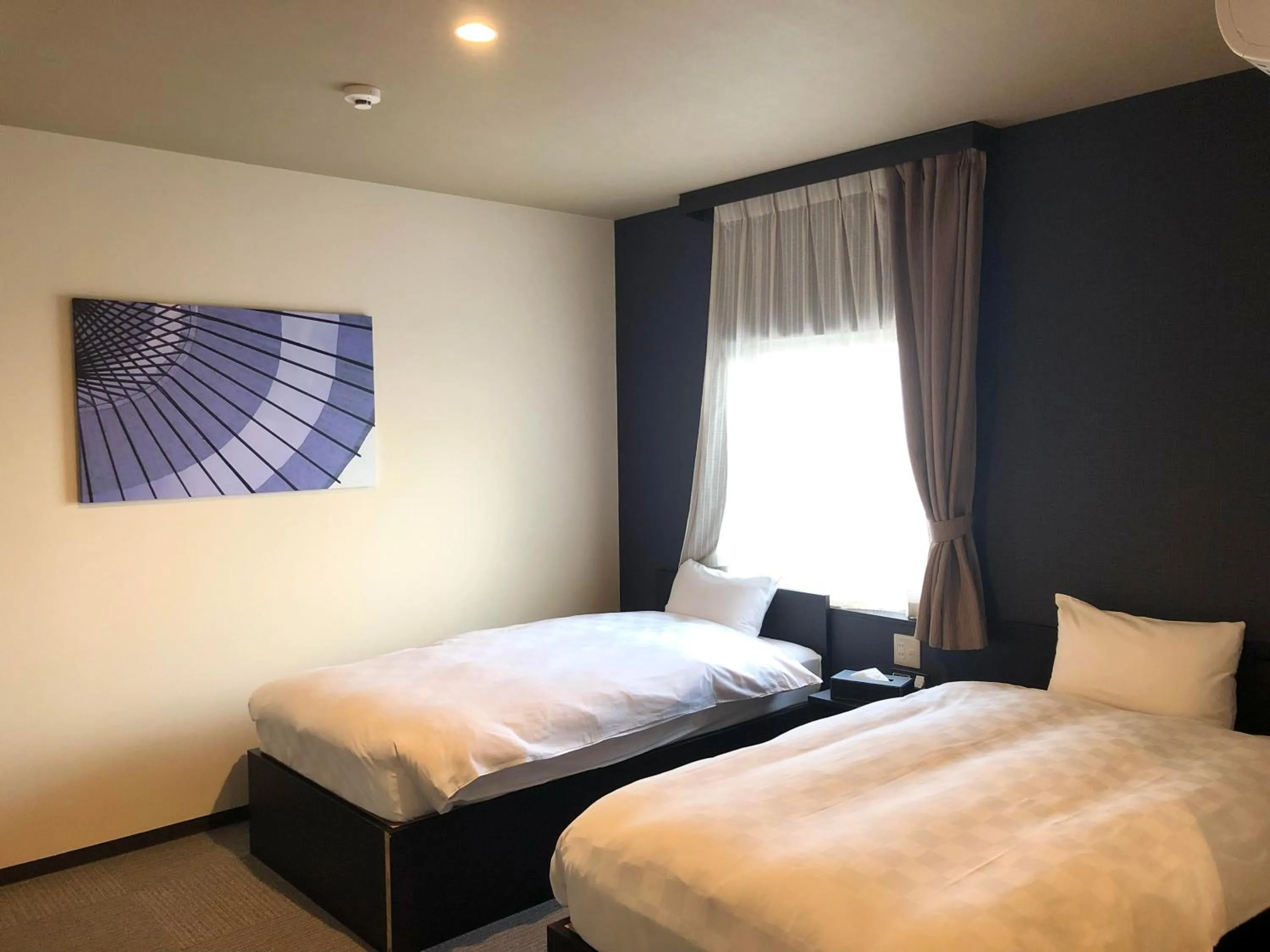 Bed in HOTEL COLLECT