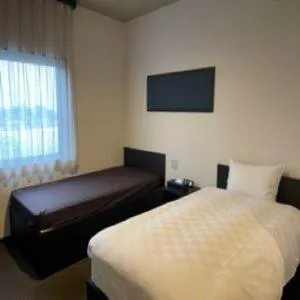 Bed in HOTEL COLLECT