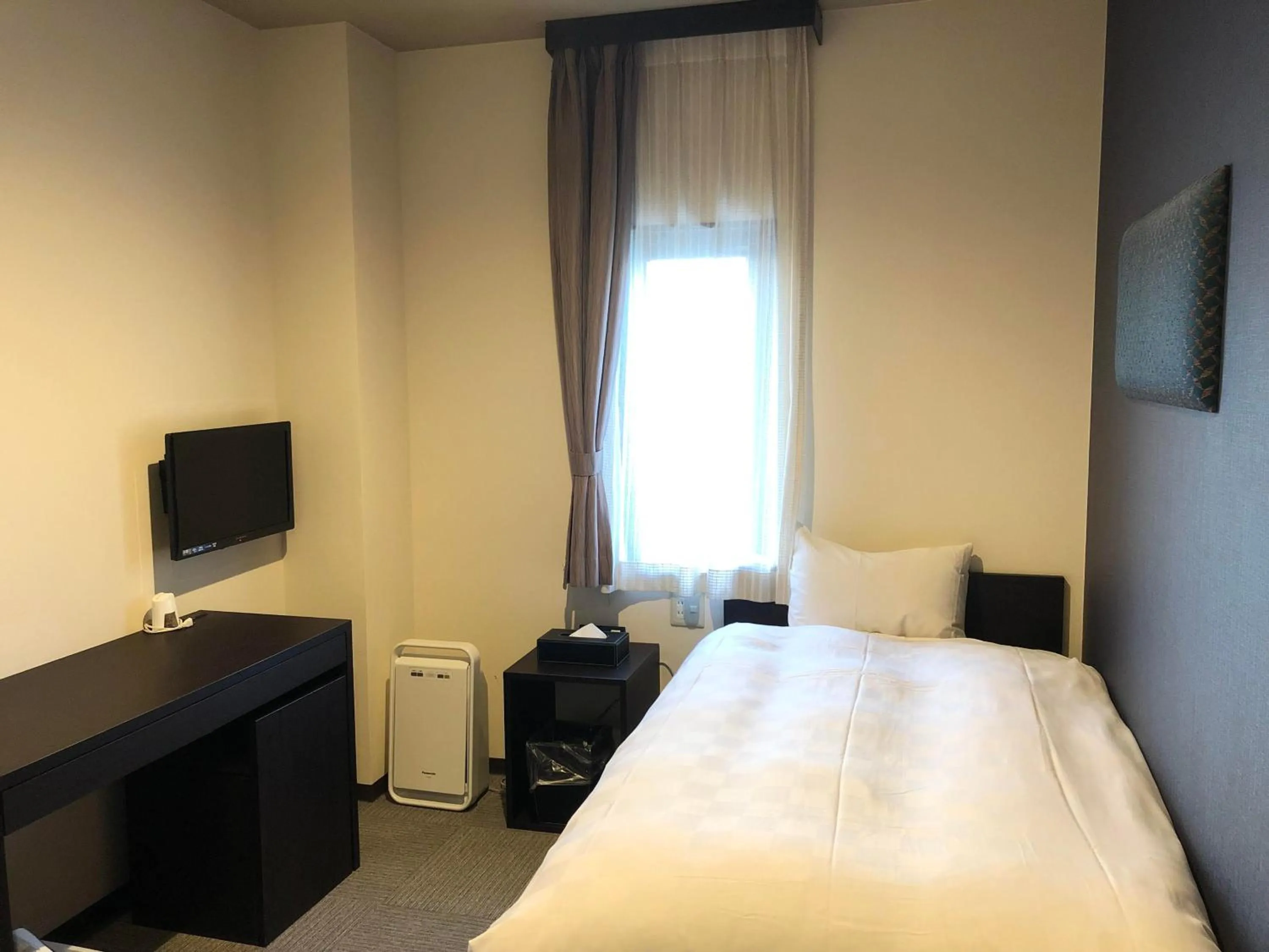 Bed in HOTEL COLLECT