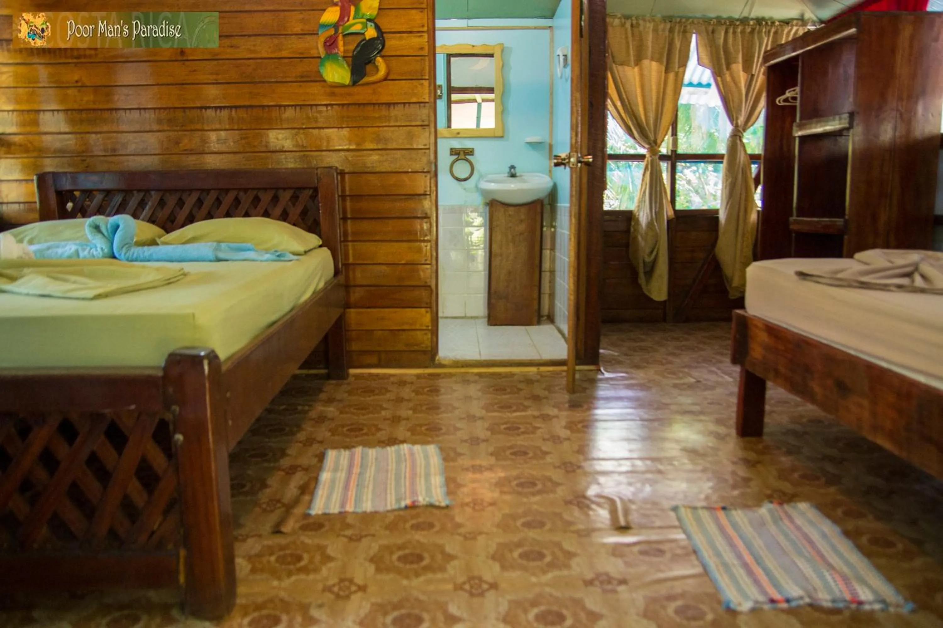 Bedroom, Bed in Poor Man's Paradise Lodge