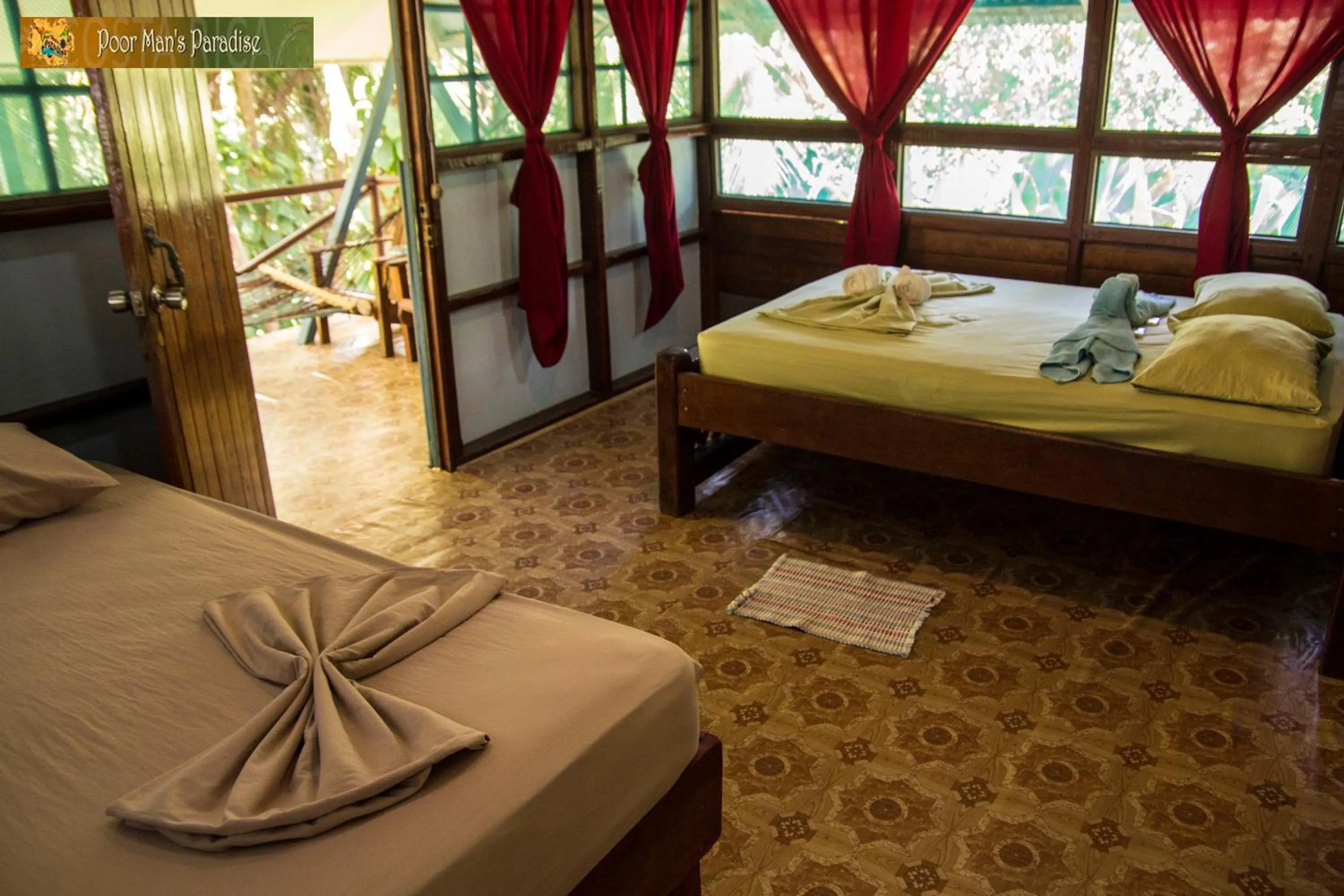 Bedroom, Bed in Poor Man's Paradise Lodge