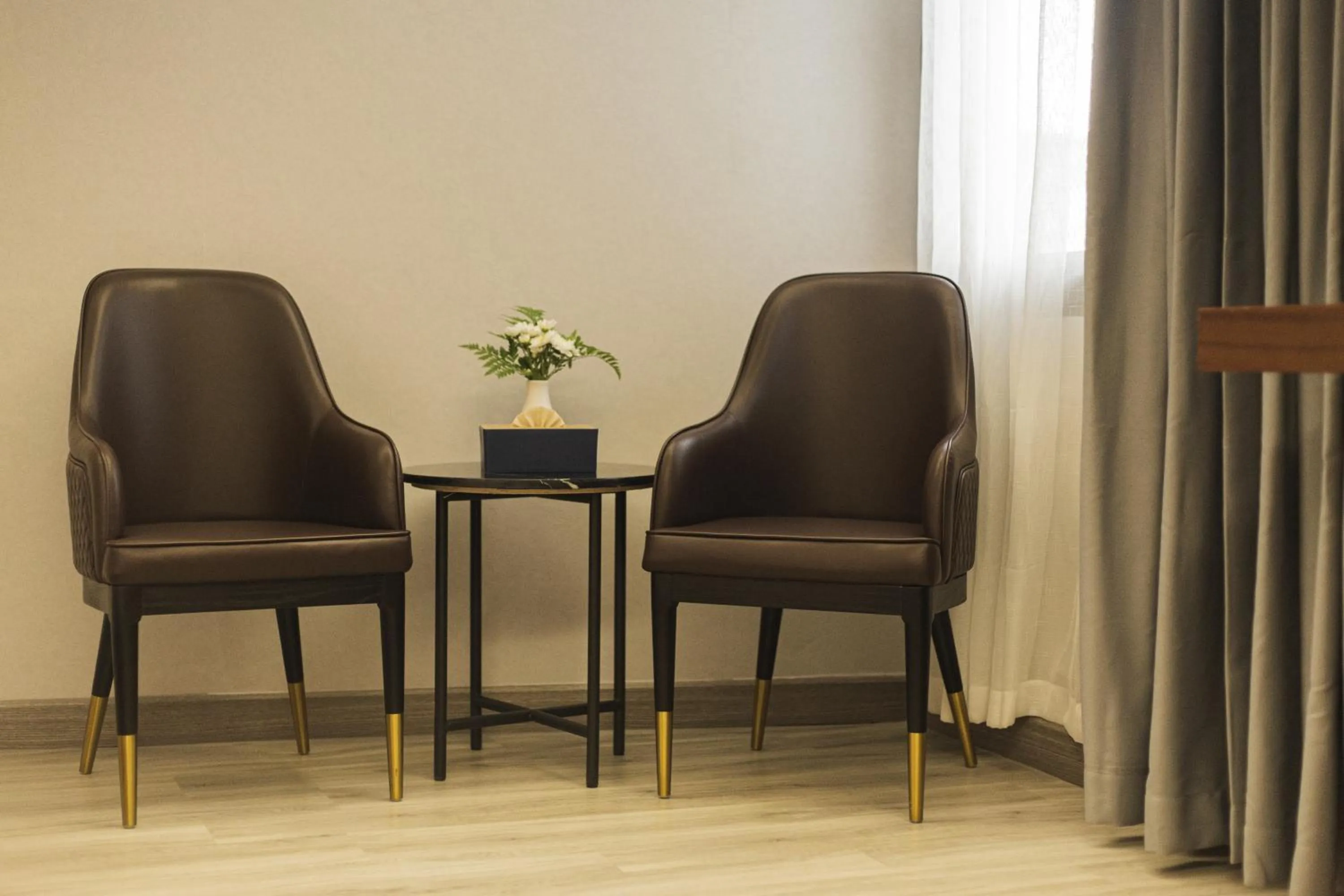 Seating area in Thapae Twins Hotel