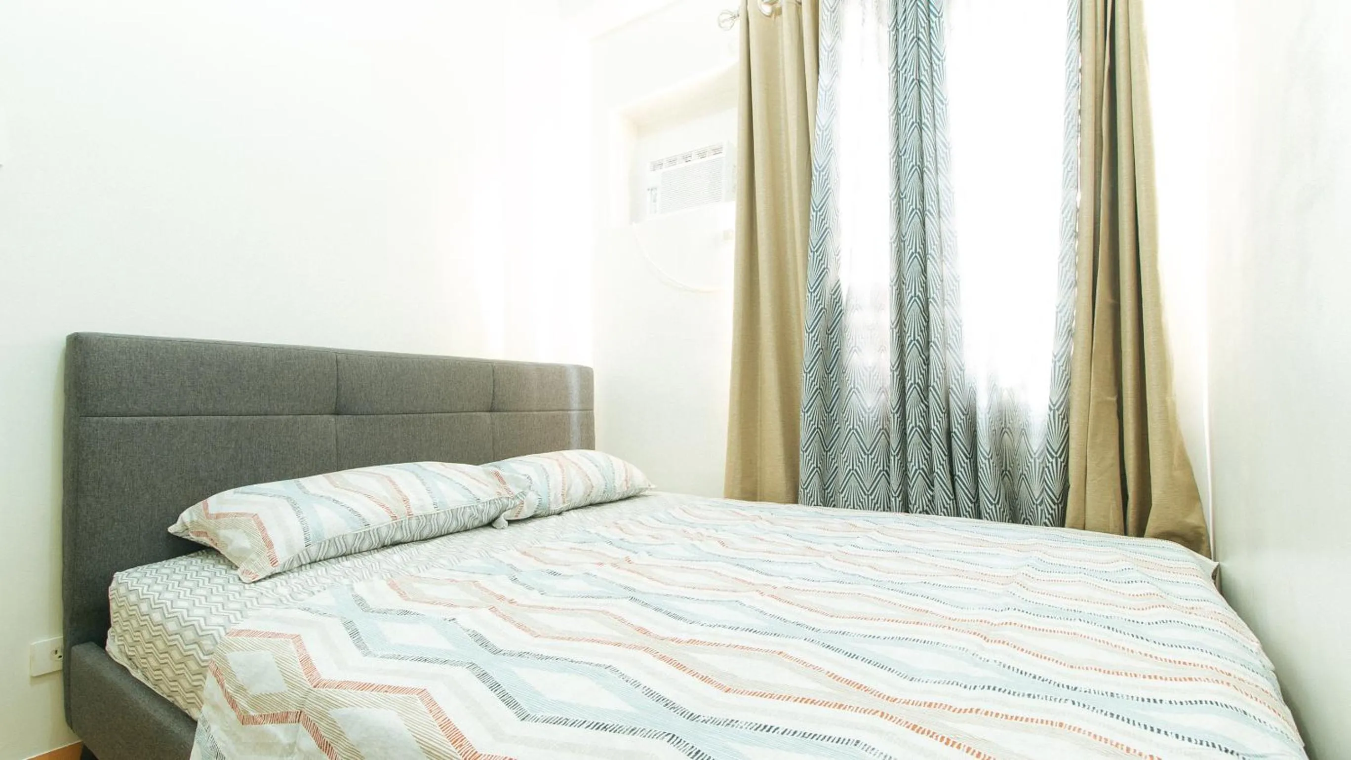 Bed in Jamah's Staycation at SMDC Trees Residences by RedDoorz