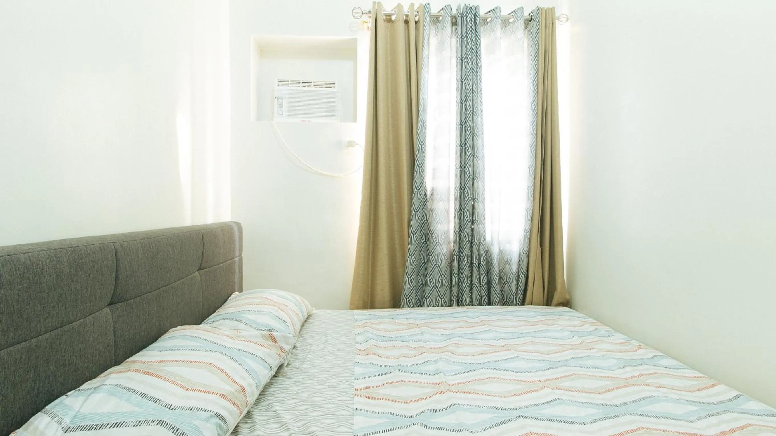 Bed in Jamah's Staycation at SMDC Trees Residences by RedDoorz