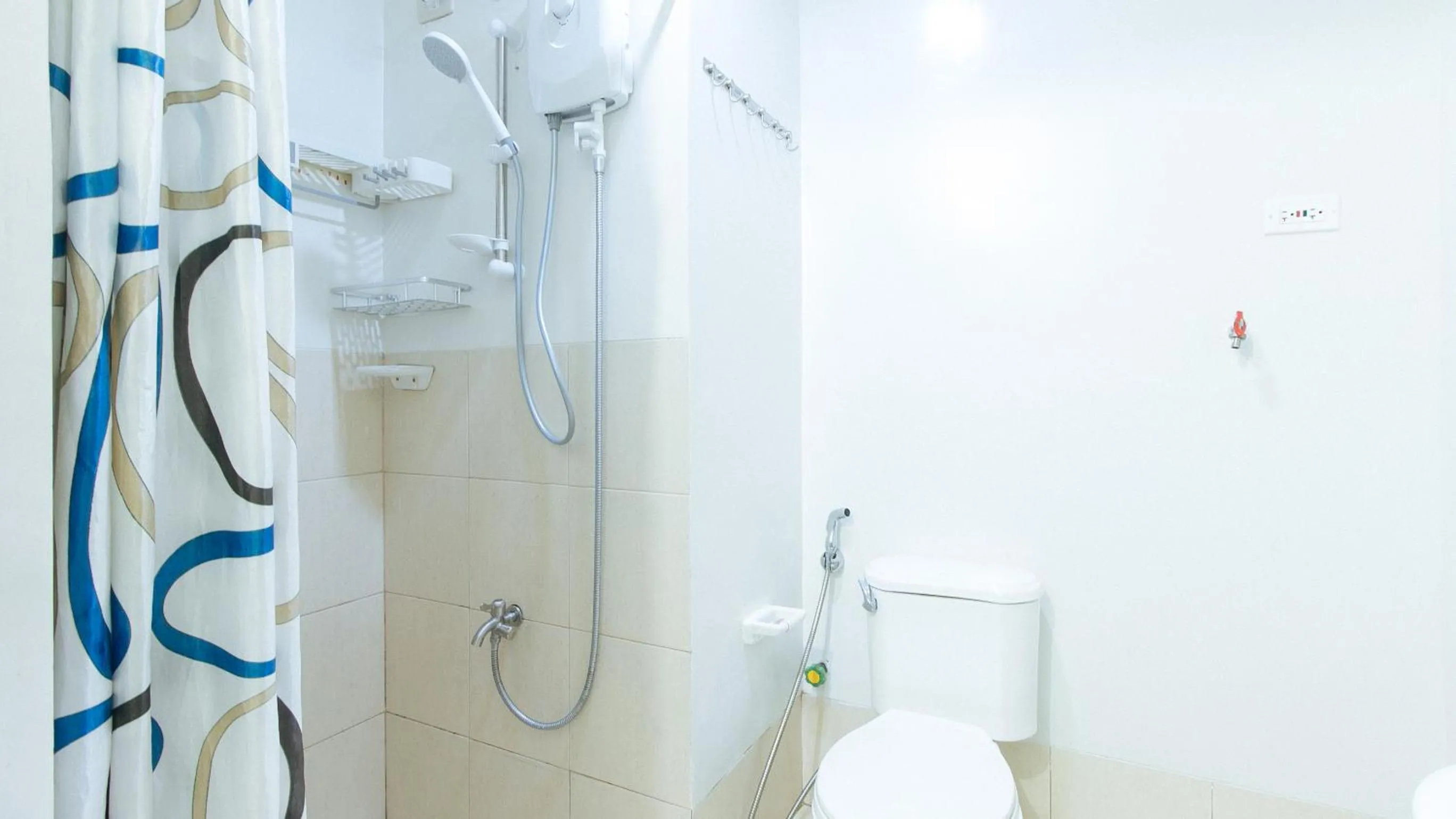 Shower in Jamah's Staycation at SMDC Trees Residences by RedDoorz