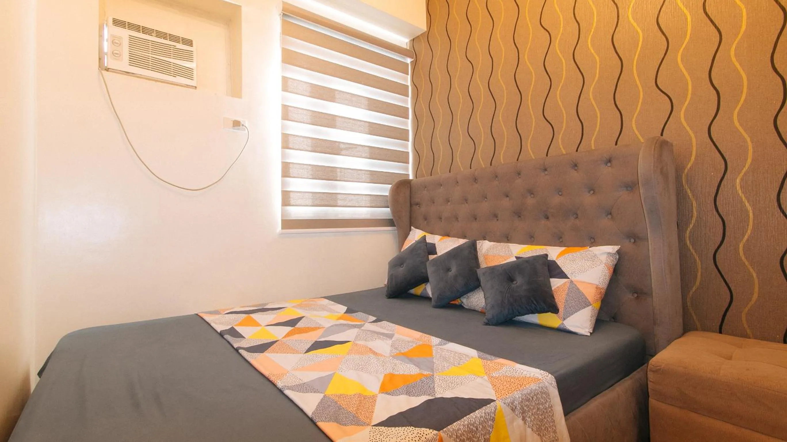 Bed in Jamah's Staycation at SMDC Trees Residences by RedDoorz