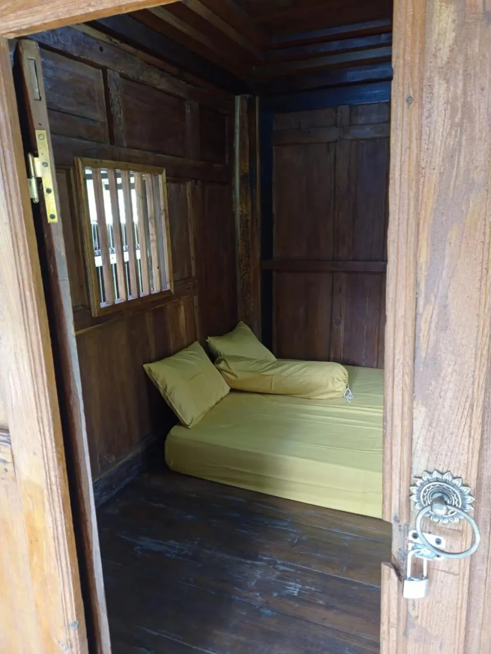 Bed in Angler Homestay & Joglo