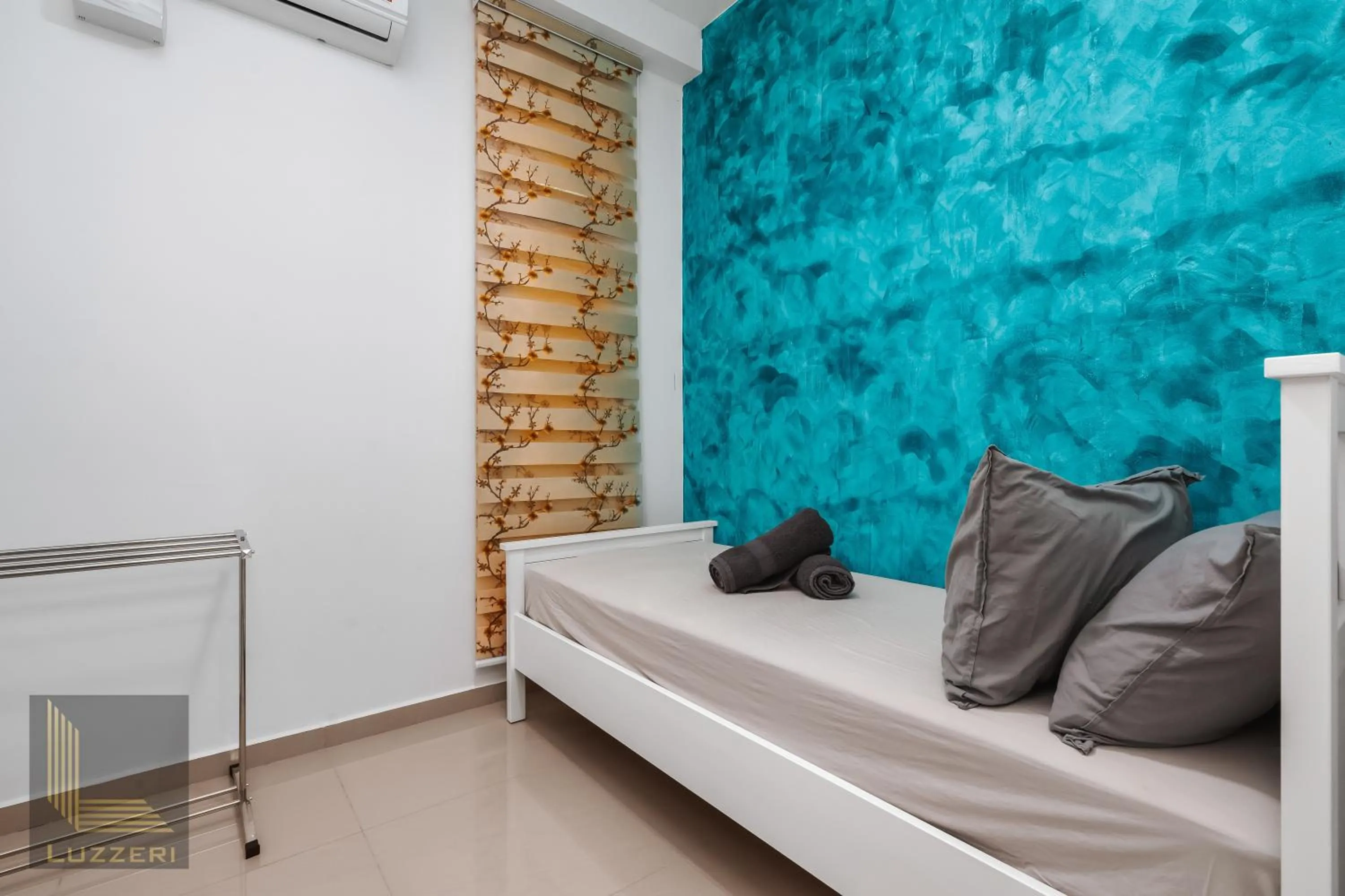 Bed in Legasi Kampung Baru Guesthouse