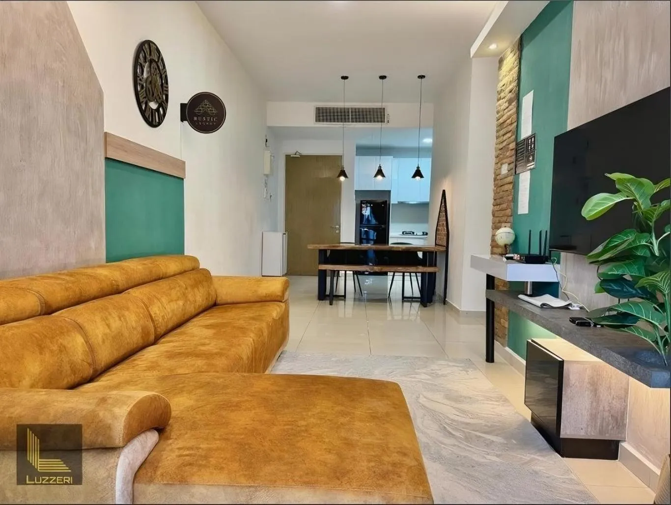 Living room in Legasi Kampung Baru Guesthouse