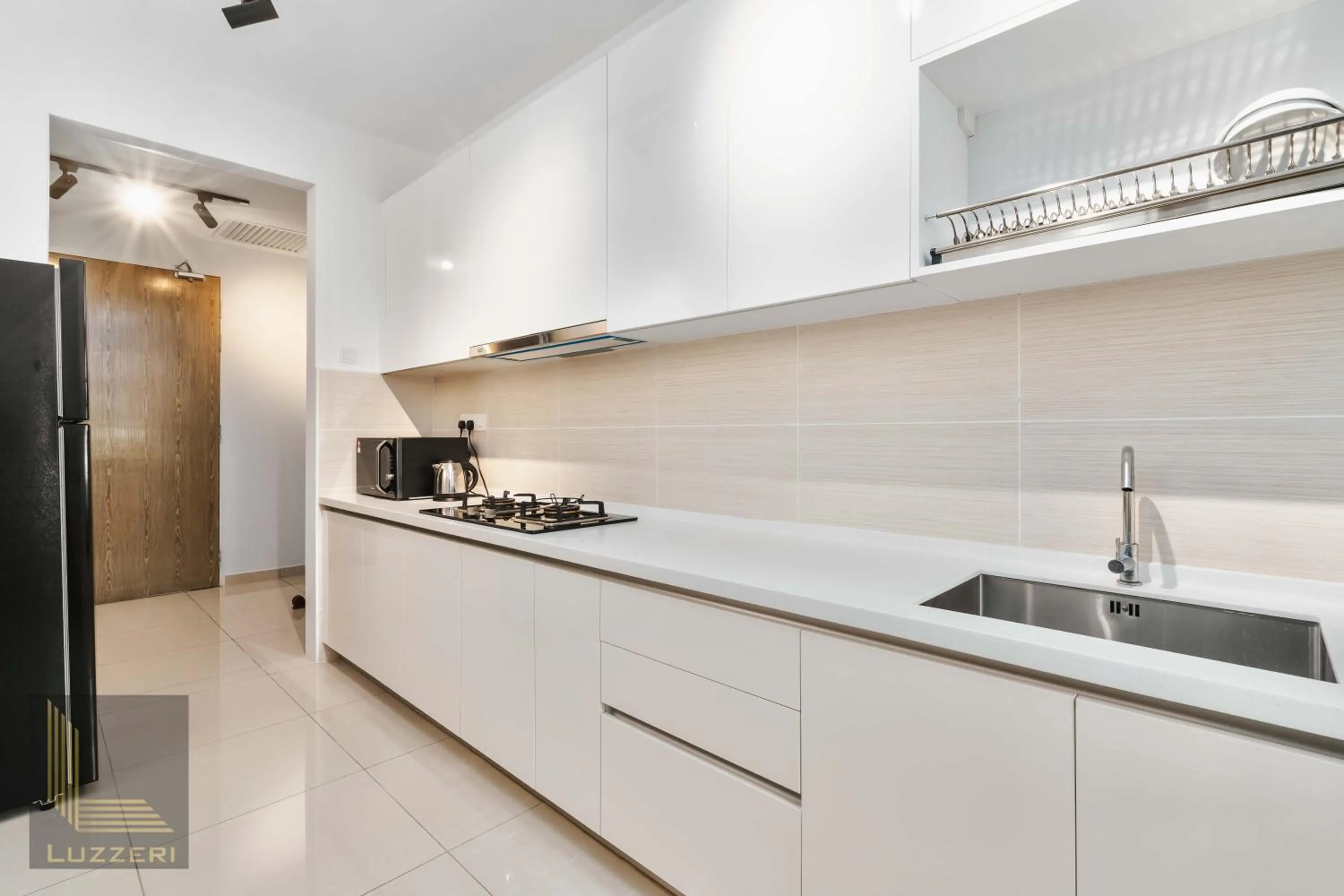 kitchen in Legasi Kampung Baru Guesthouse