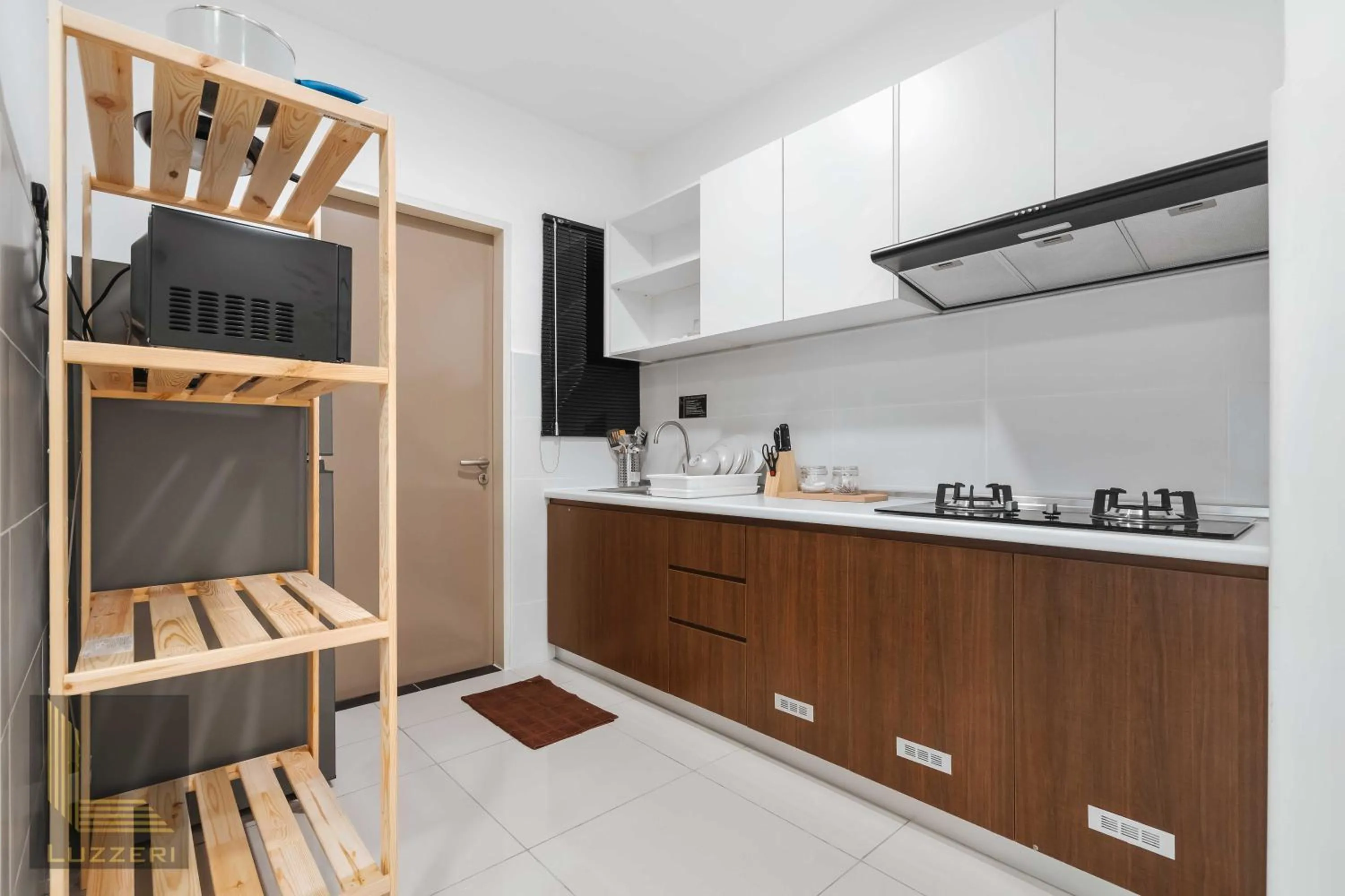 kitchen in Legasi Kampung Baru Guesthouse