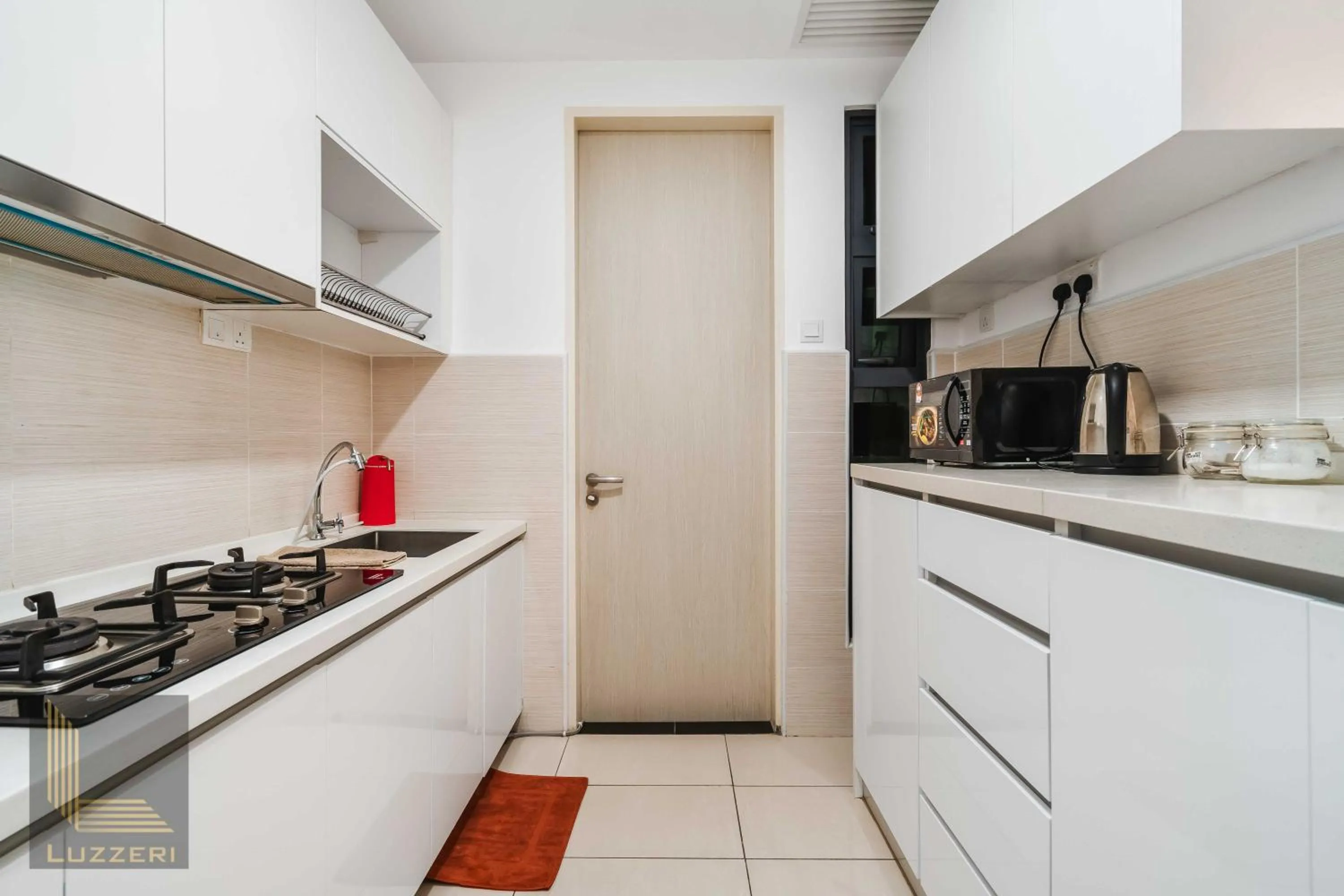 kitchen in Legasi Kampung Baru Guesthouse